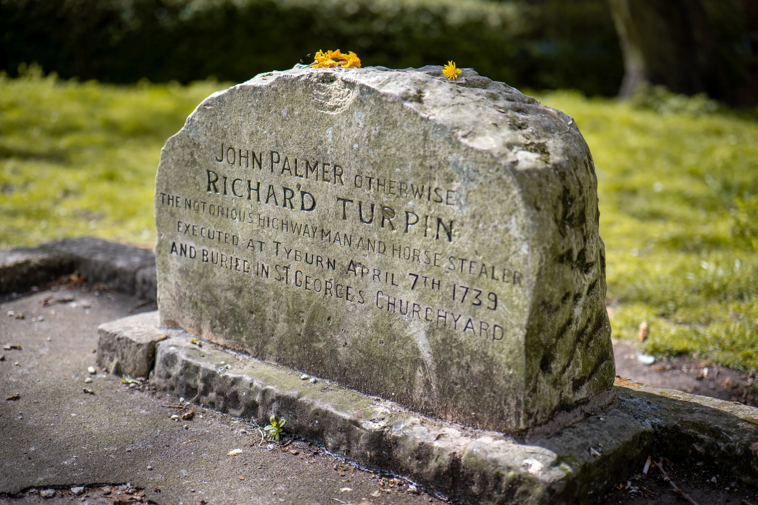 Grave of notorious highwayman and horse thief Dick Turpin. St George, York, North Yorkshire.