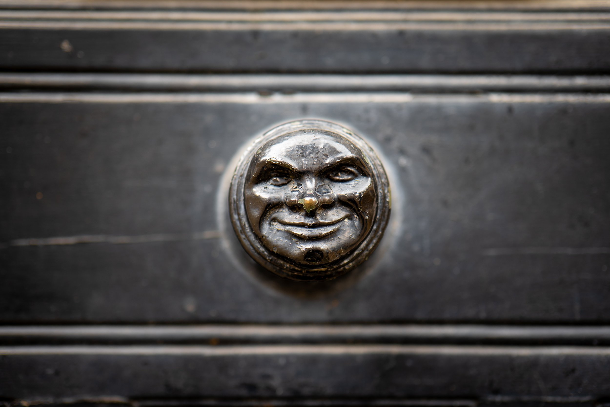 Smiling doorknob. Bakewell, Derbyshire.