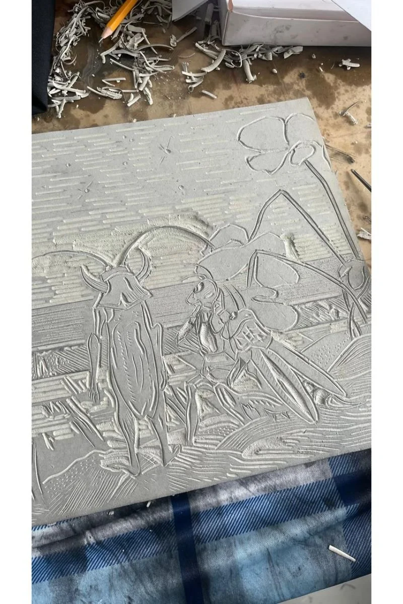 Part of the linocut carved out in my home studio