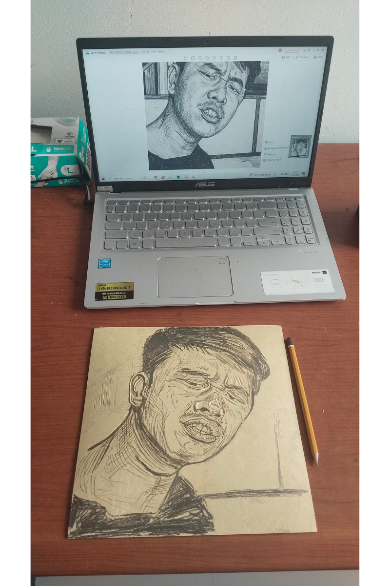 Drawing a pencil image onto a linoleum block for a professional relief print