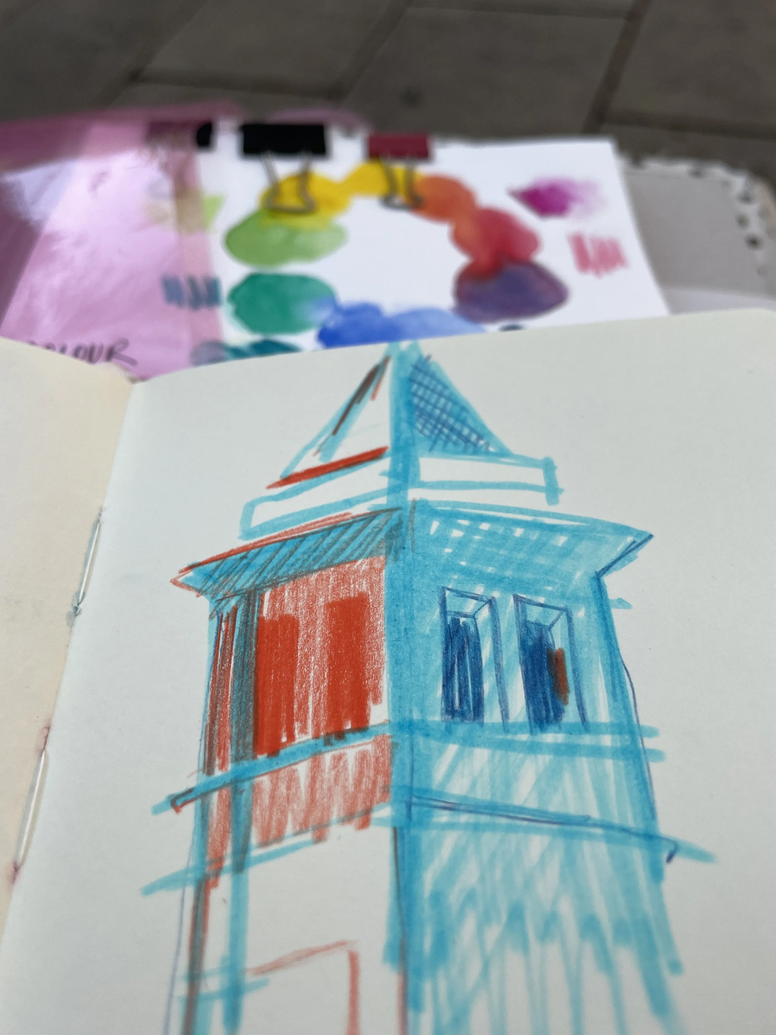 A colourful sketch of a tower seen from a square in Barcelona.
