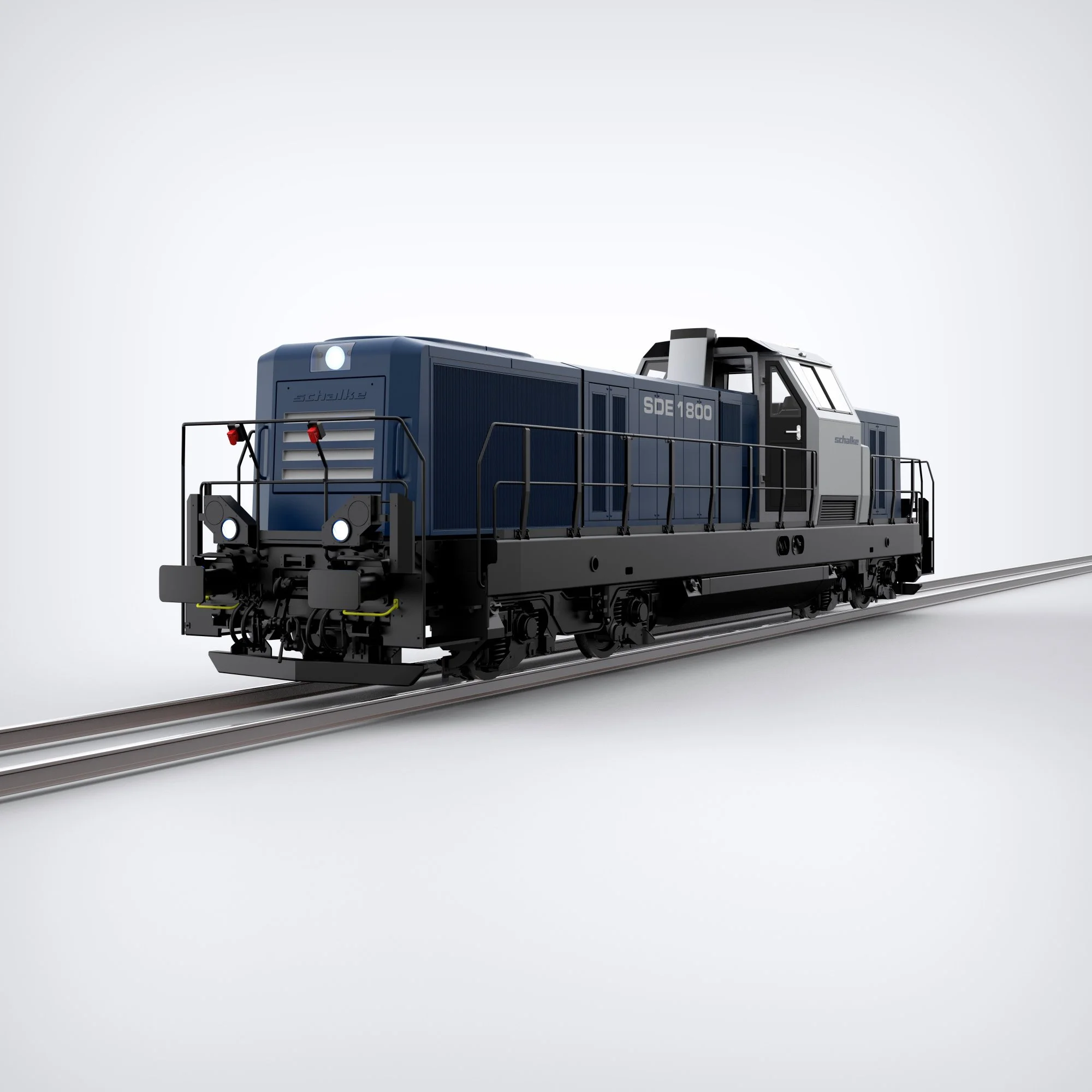 Das Industrial-Design der Schalke SDE 1800 Lokomotive zeigt ein kraftvolles, blau-silbernes Gehäuse auf Schienen, das durch seine klare Linienführung technologische Präzision und Dynamik ausstrahlt