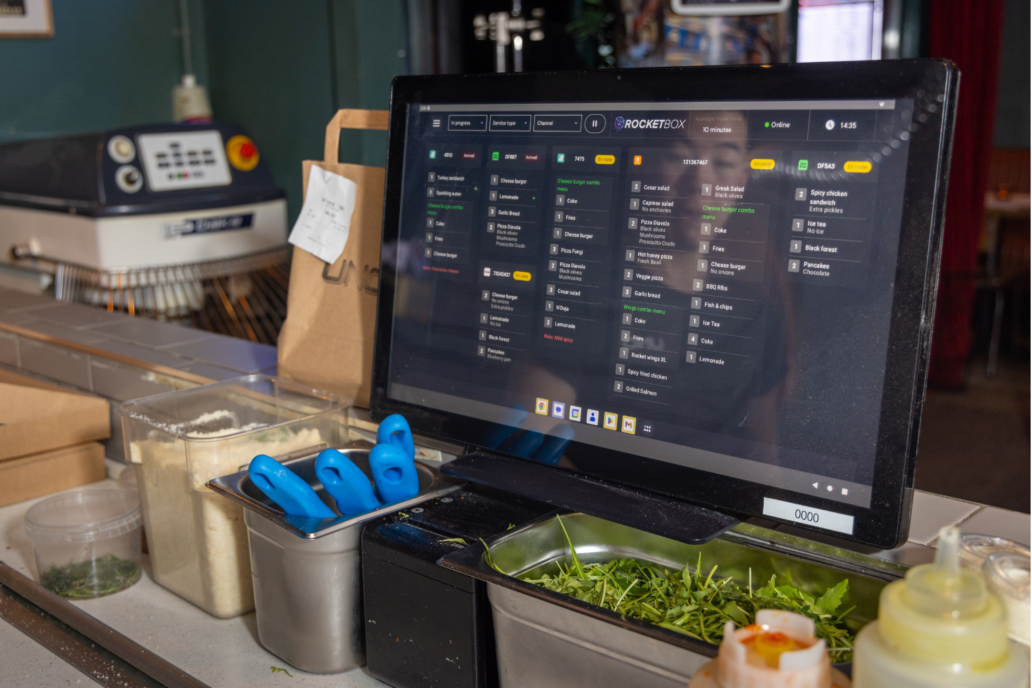 KDS vs kitchen printers: Compare order speed, accuracy, and kitchen efficiency. Learn when a Kitchen Display System wins, when printers still work, and how RocketBox levels up delivery ops.