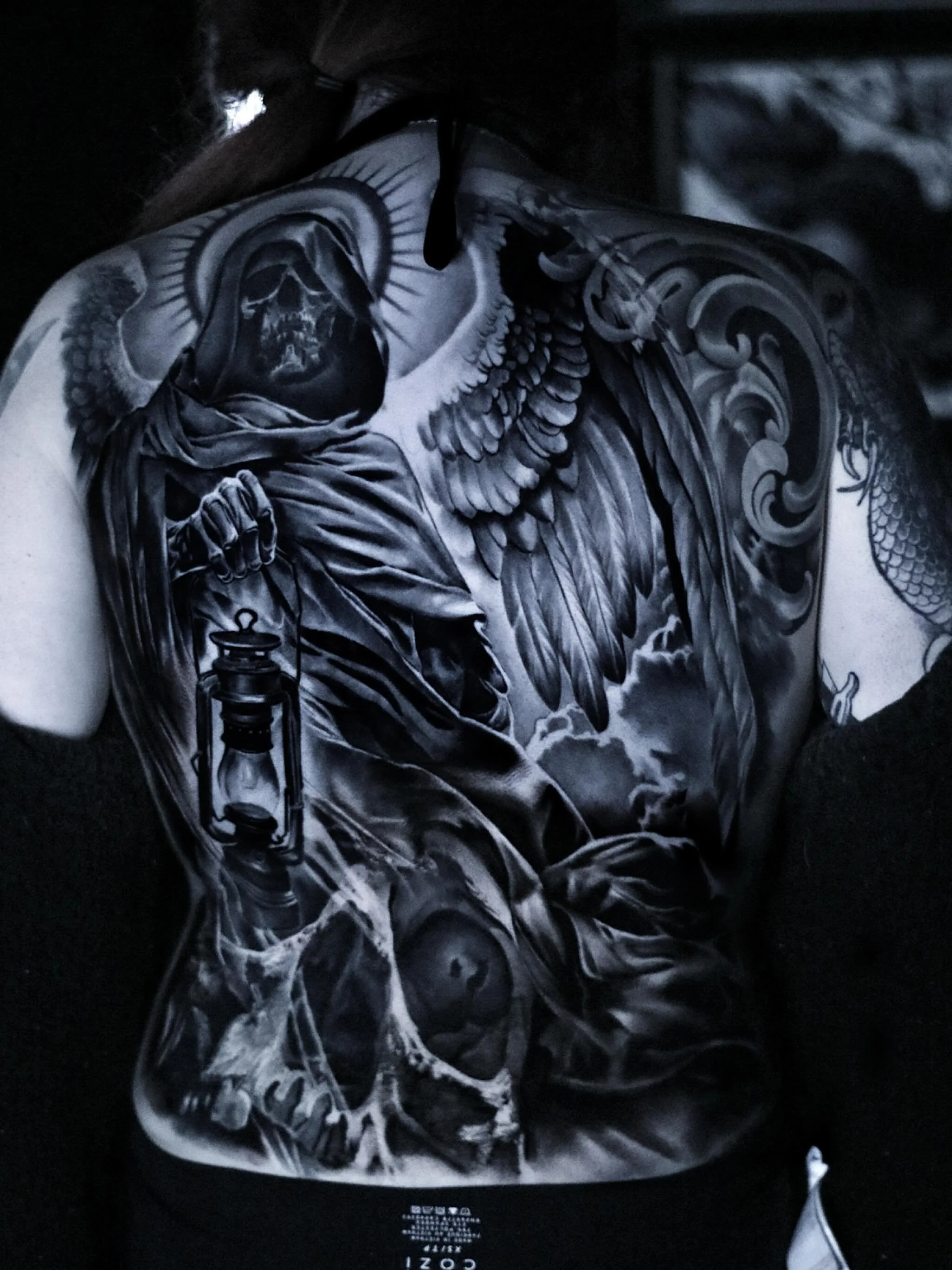 Finally finished this back piece for Morgan a few months back. So stoked with the result. 90% healed ☠️

#skulltattoo #backtattoo #backtattoos #skull #grimreapertattoo #grimreaper #blackandgreytattoo #bngtattoo #inkfreaks #allegoryink #fusionink #fki