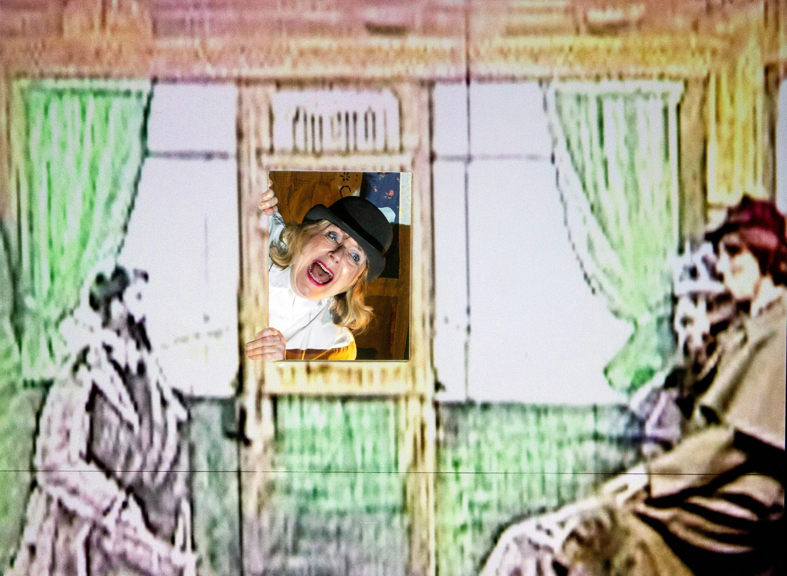 Sue appears screaming in the window of a train carriage