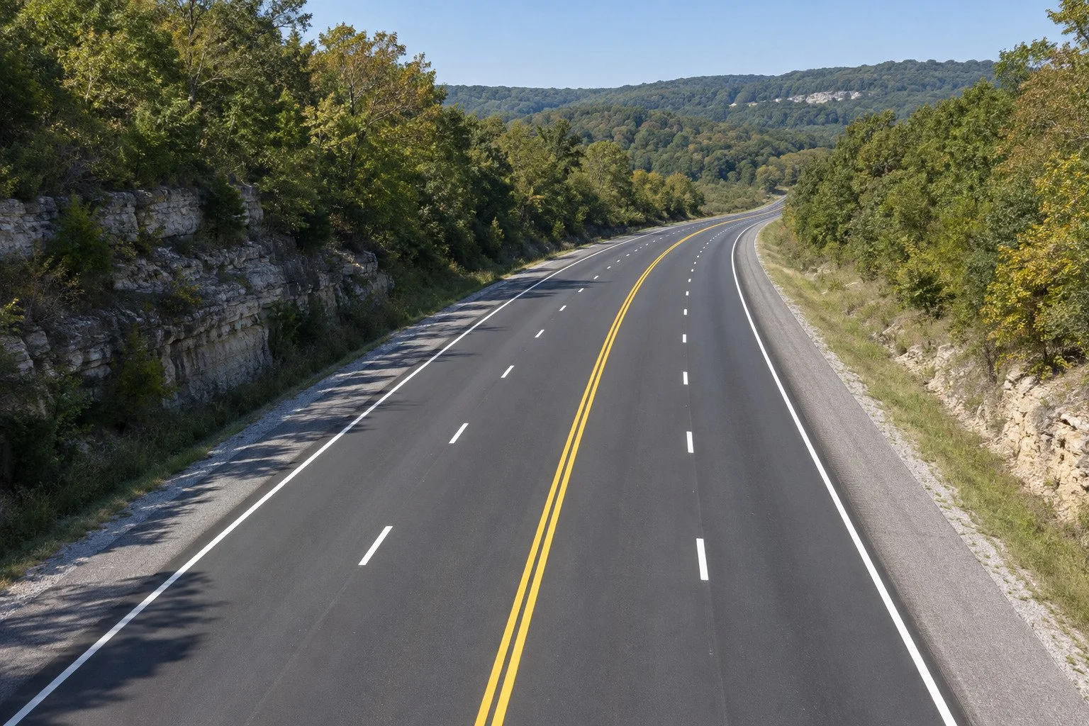 New thermoplastic lane lines on a four-lane highway in Middle Tennessee