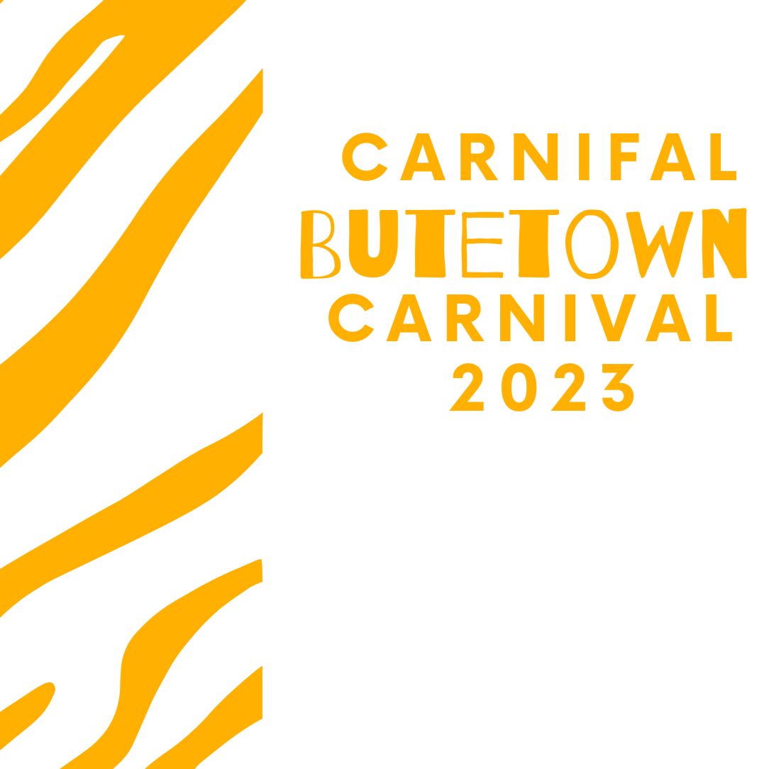 Black background with yellow and black zebra stripe design, text reads 'Carnival Butetown Carnival 2023'.