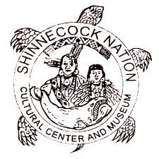 Logo of Shinnecock Nation Cultural Center and Museum featuring a turtle with a circular banner containing the name and a central illustration of a person and child with a turtle shell design.