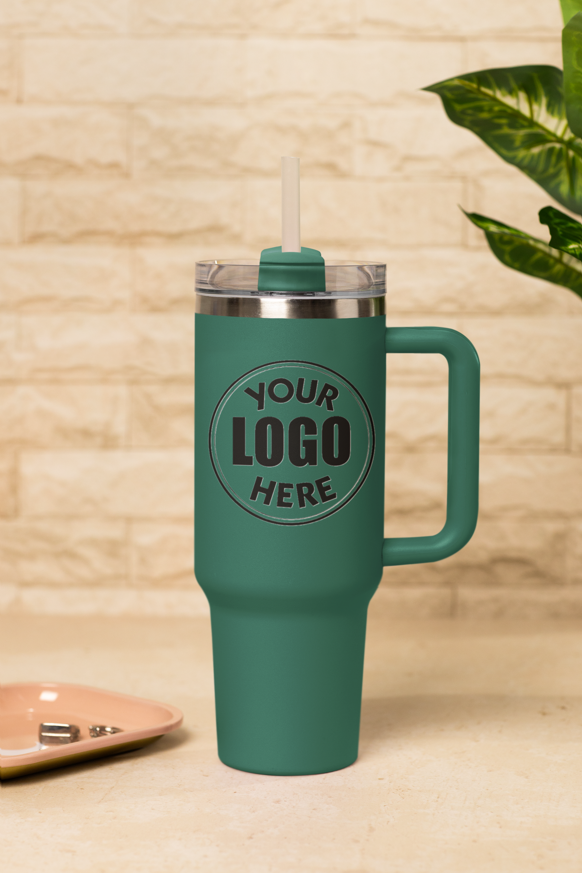 mockup-of-a-sublimated-stanley-tumbler-placed-on-a-table-with-a-plant-m54042.png