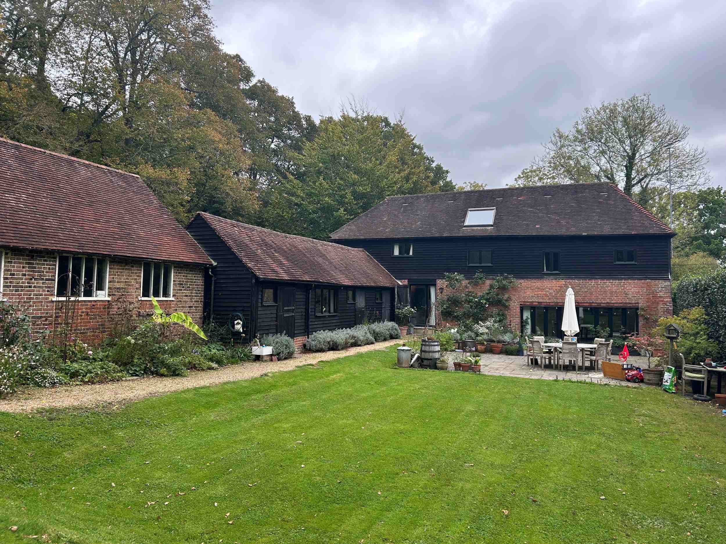 Grade II listed barn and outbuilding in Sussex with planning permission
