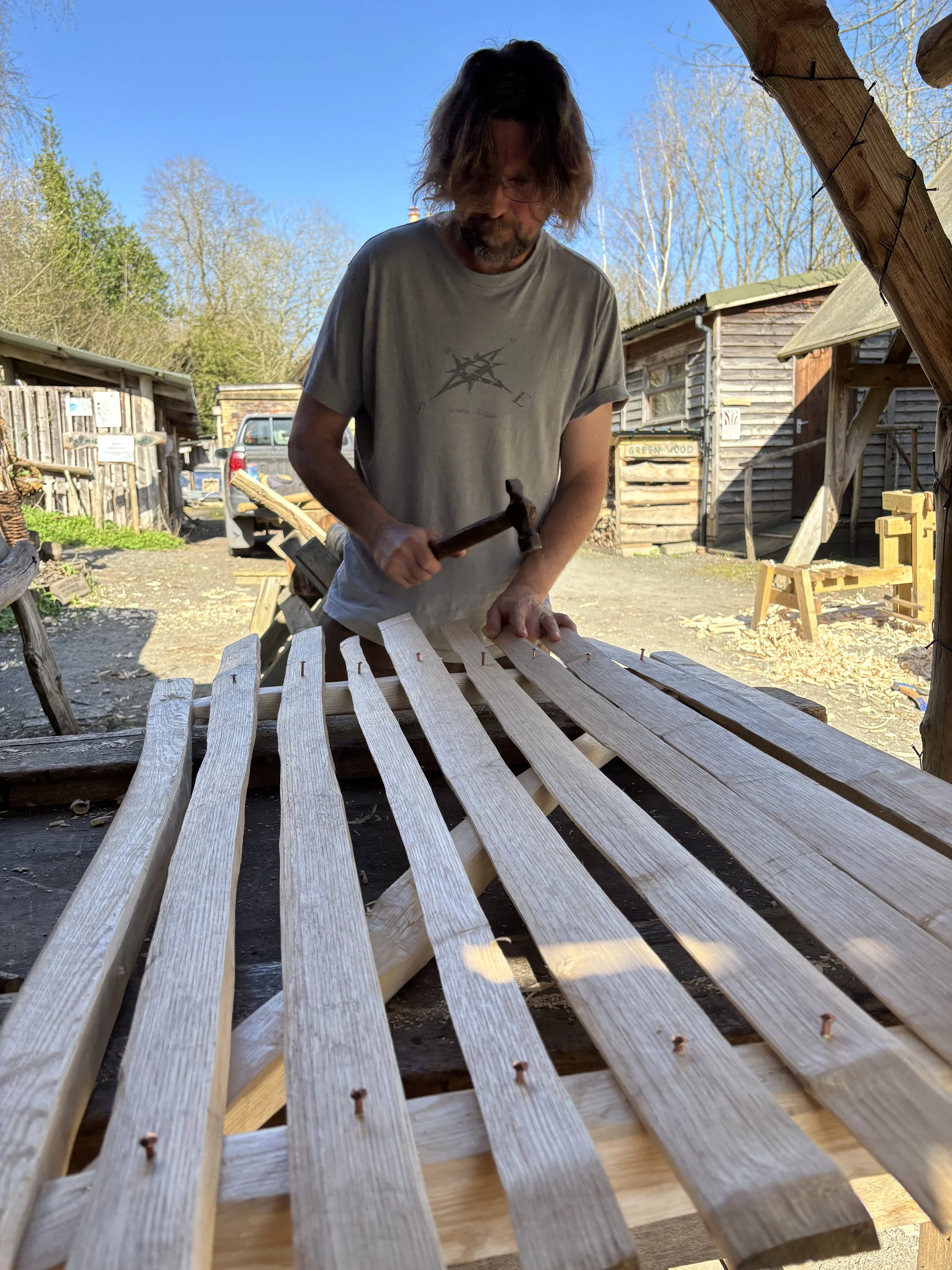 Final nailing on a gate course