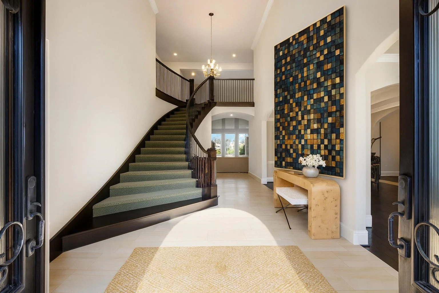 Gilded Night, a gold and blue wood block piece in a grand entry foyer