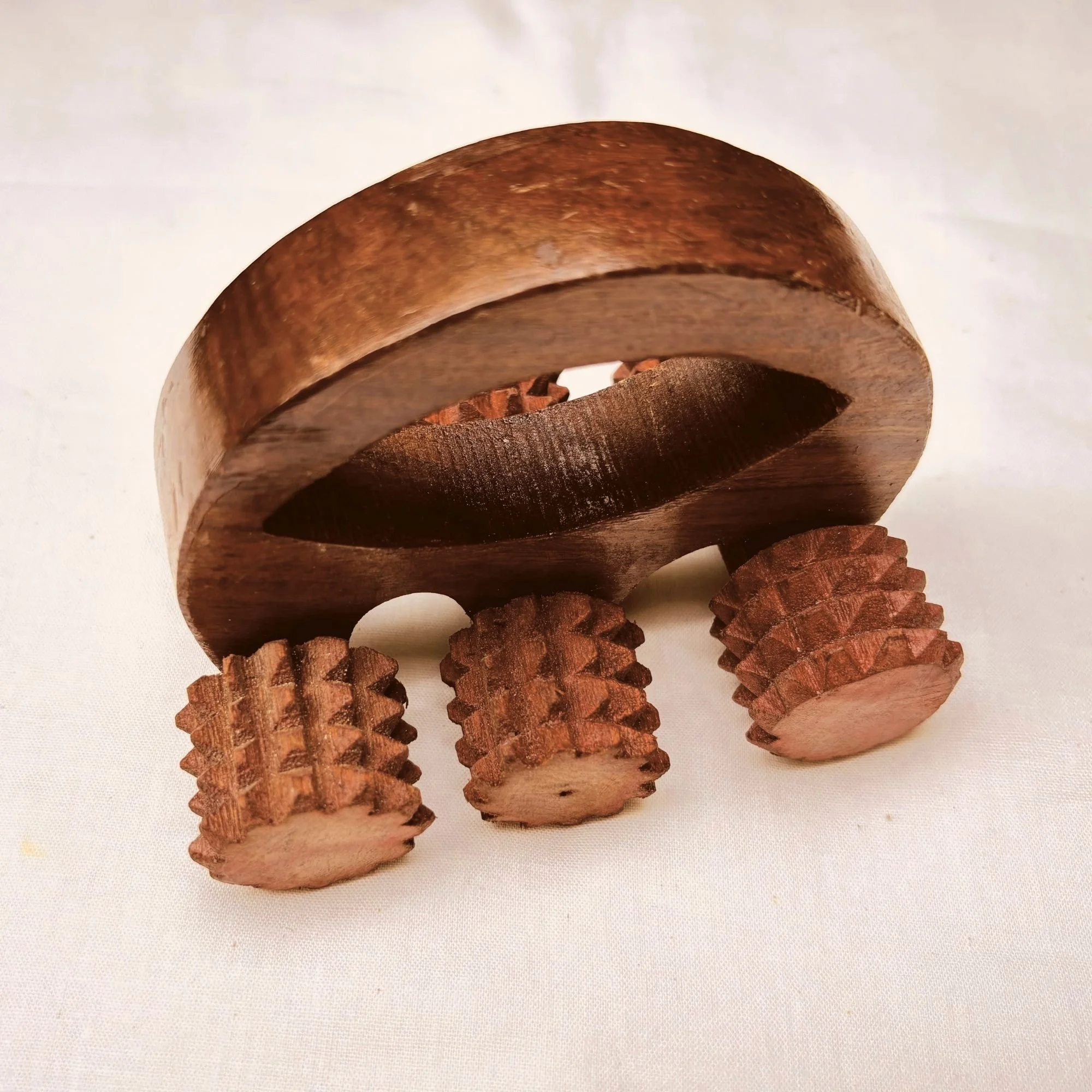 Handheld_wooden_body_massage_roller_hero.jpg