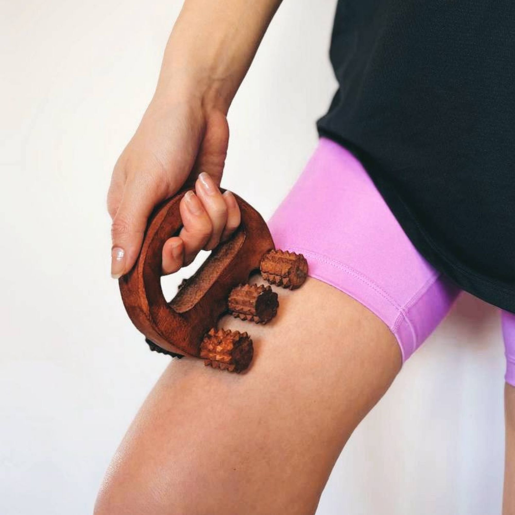 Handheld_wooden_body_massage_roller_legs.jpg