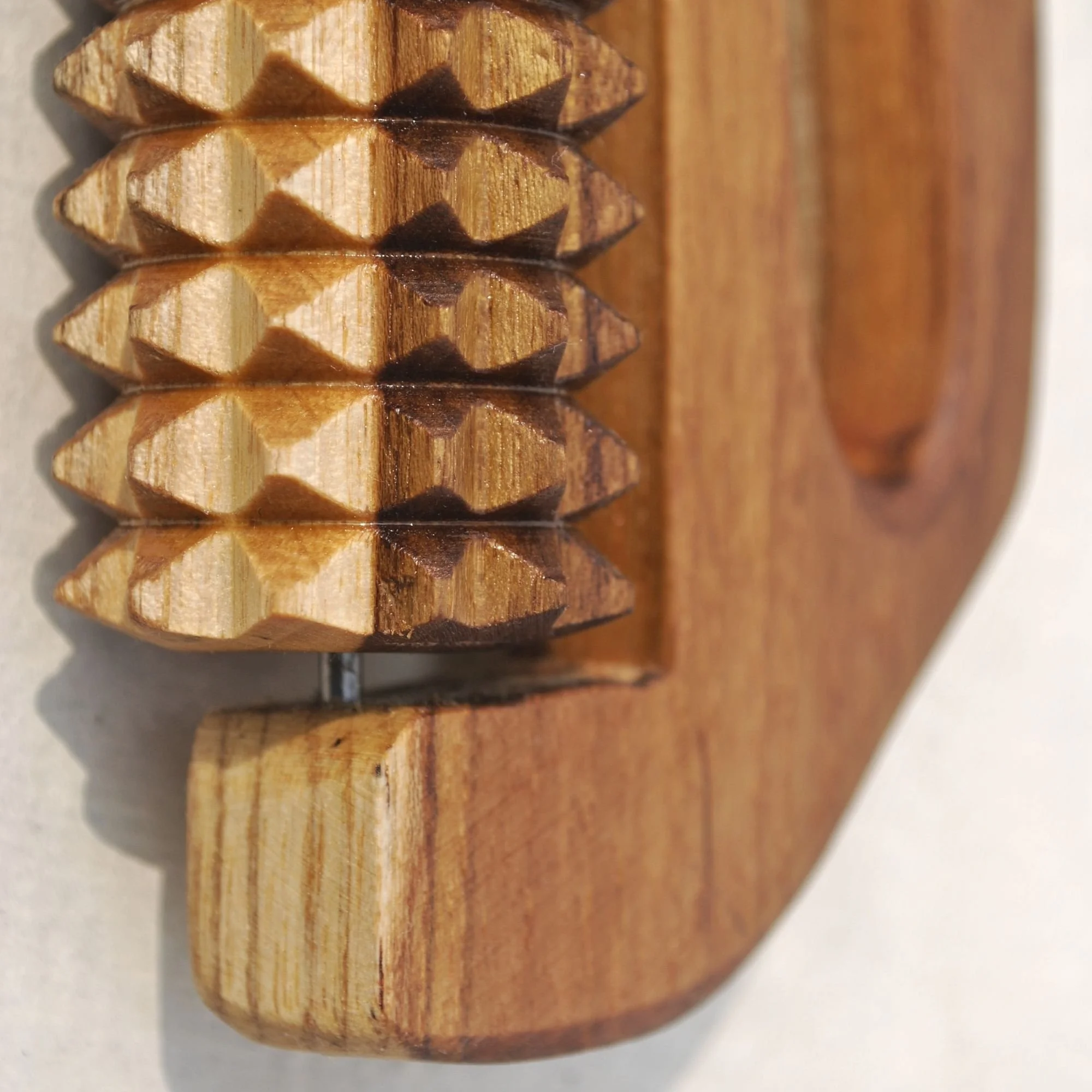 Wooden_cellulite_massage_tool_back_closeup.jpg