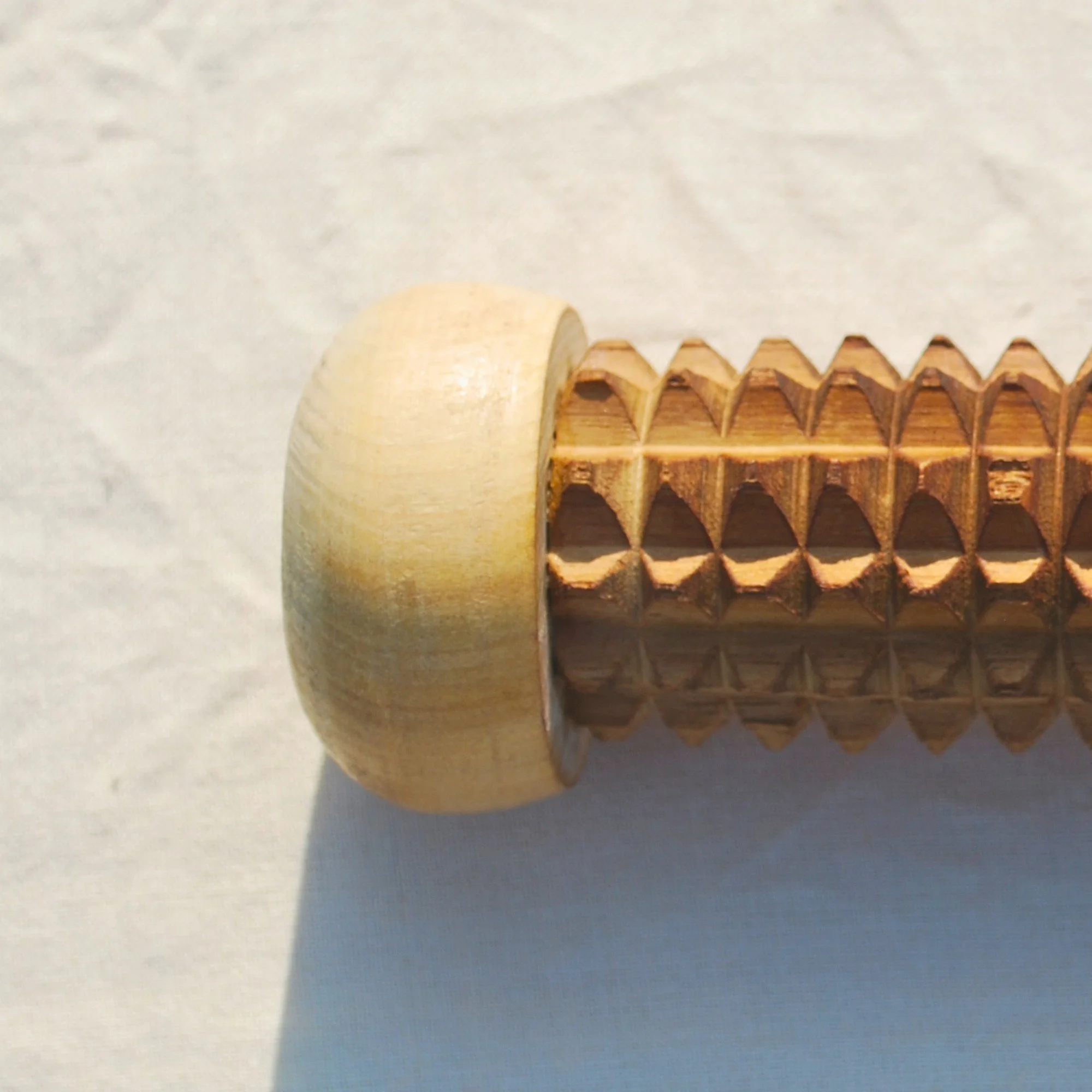 wooden_muscle_recovery_roller_handle.jpg