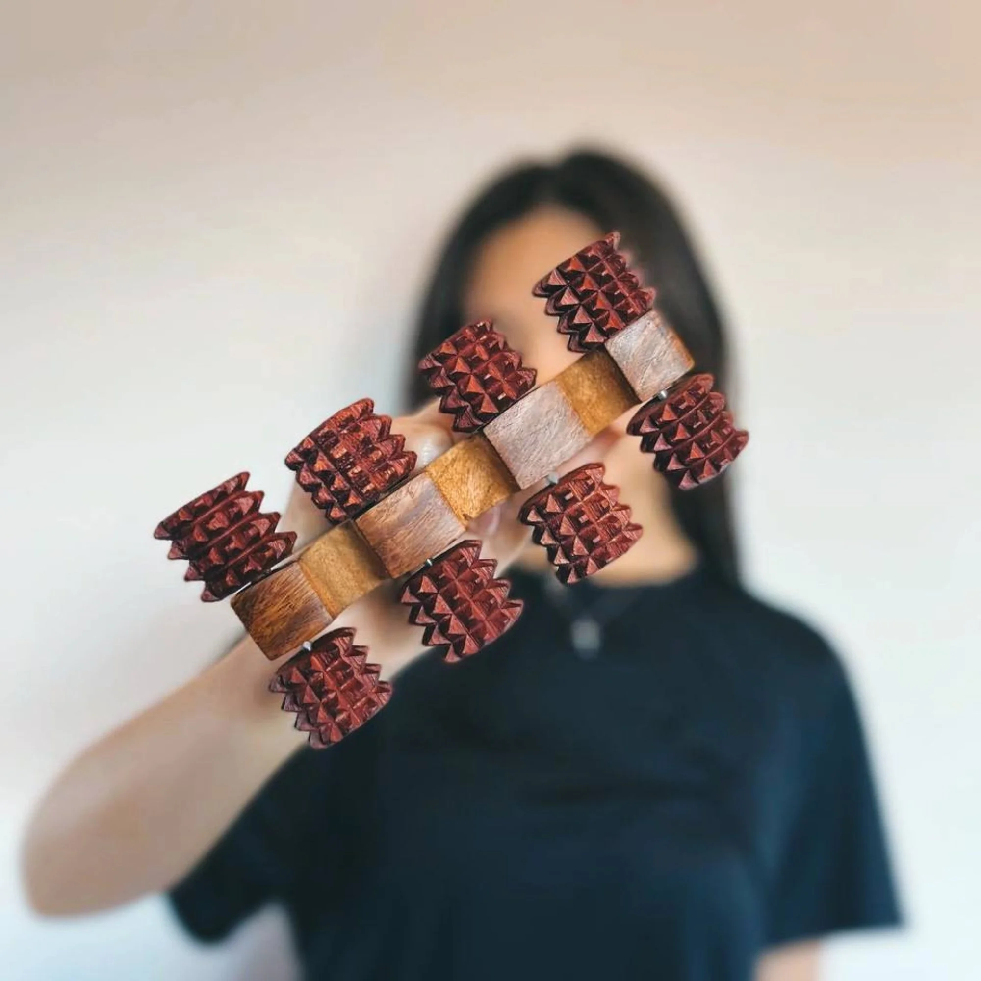 Handheld_wooden_deep_tissue_massager_lifestyle.jpg