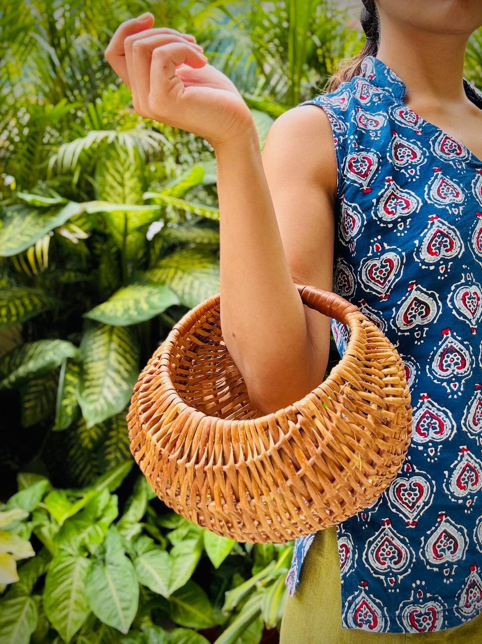 handwoven_bamboo_moon_bag_in_use.jpg