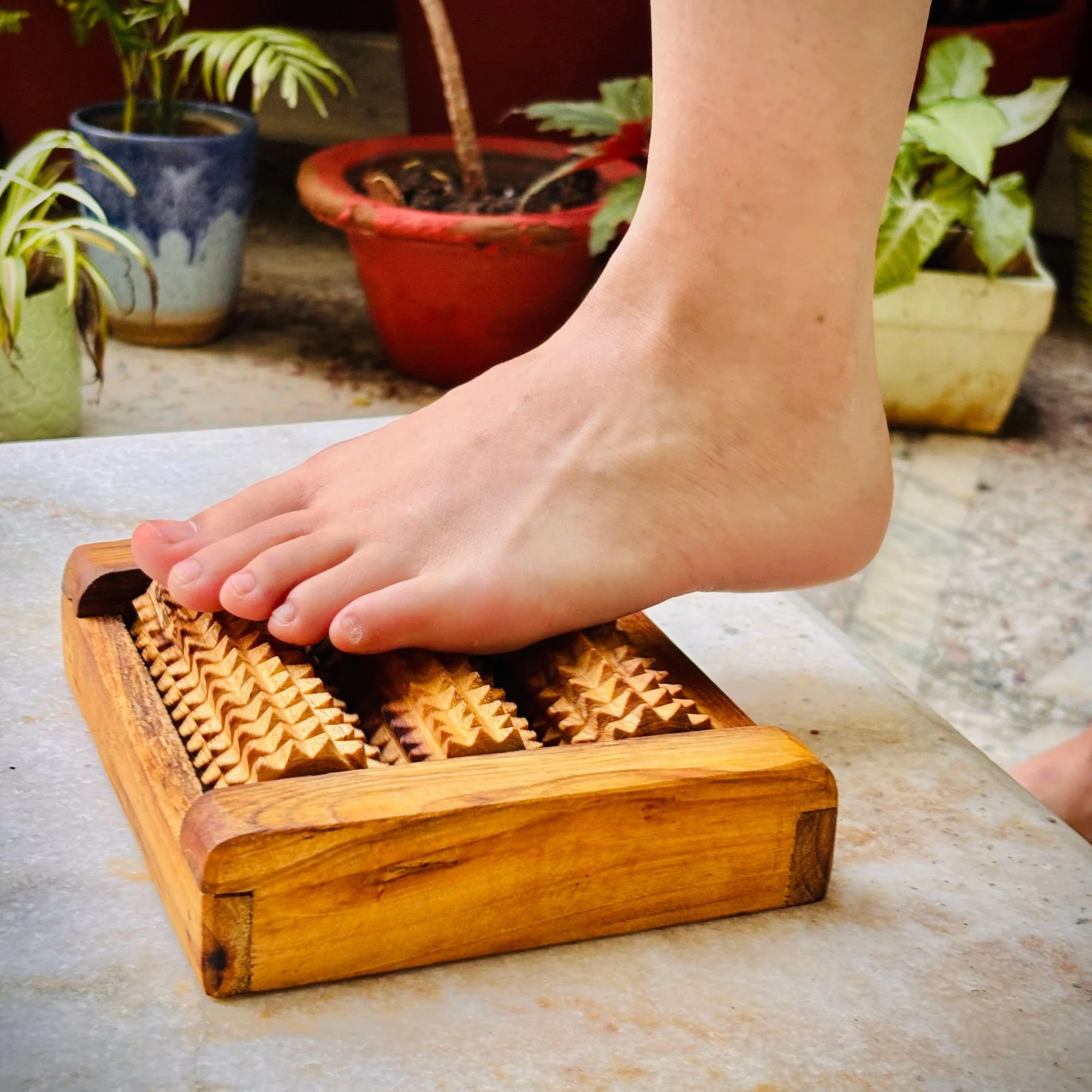 Wooden_foot_reflexology_roller_lifestyle_shot.jpg