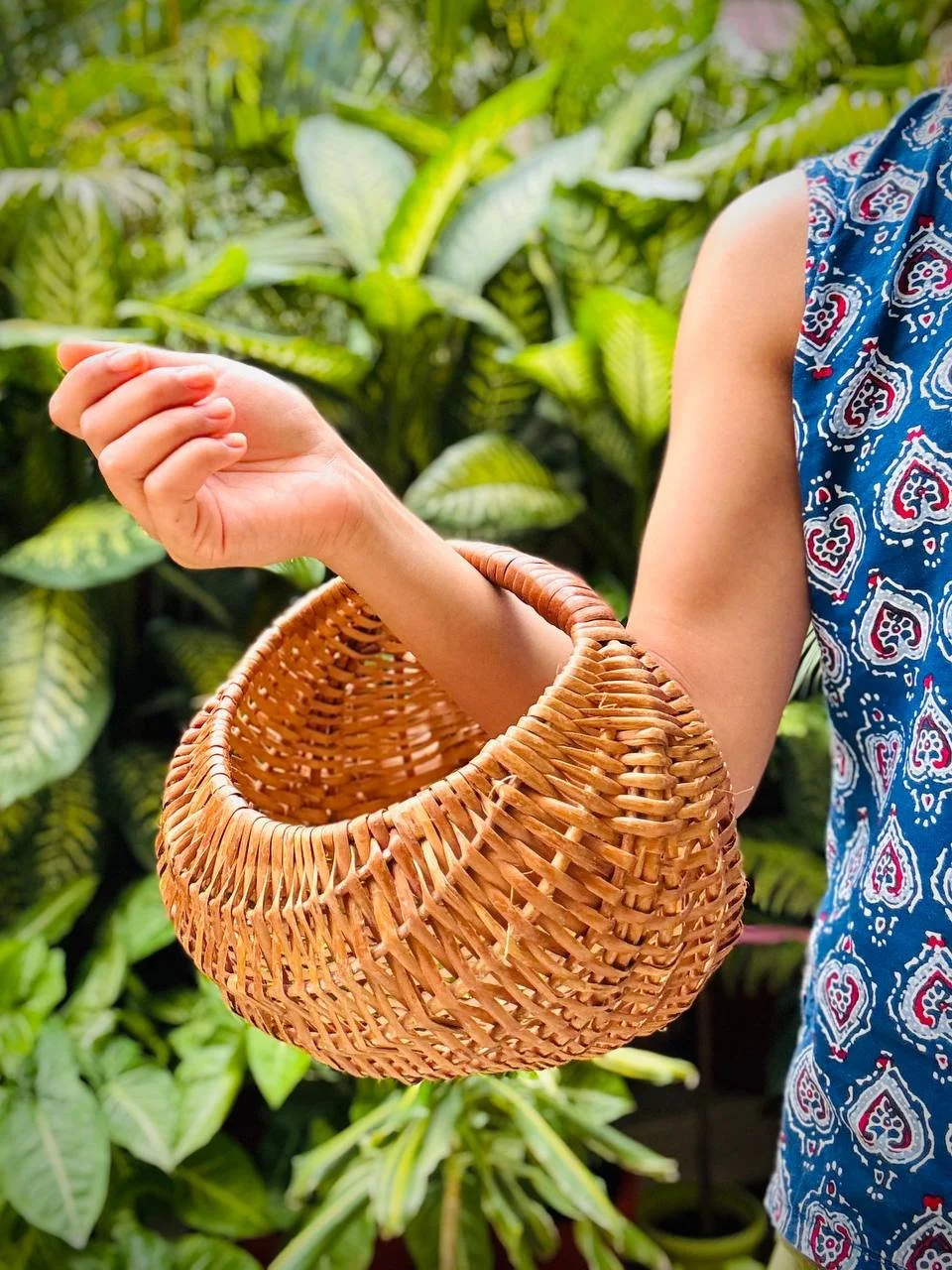 handwoven_bamboo_moon_tote_in_hand.jpg