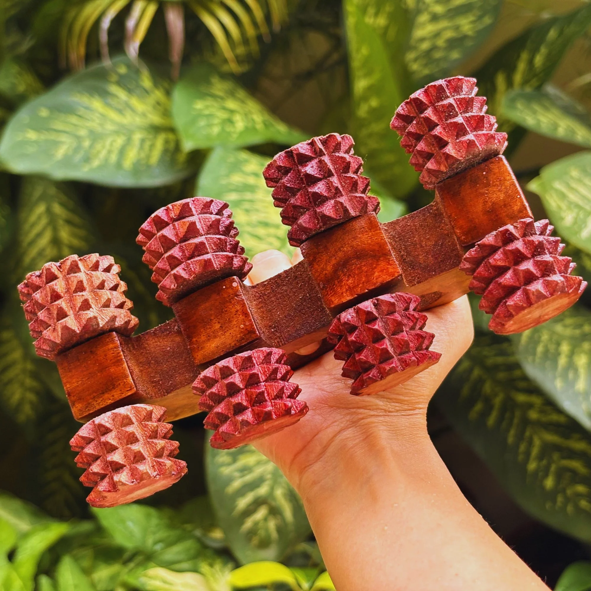 Handheld_wooden_deep_tissue_massager_lifestyle_back.jpg