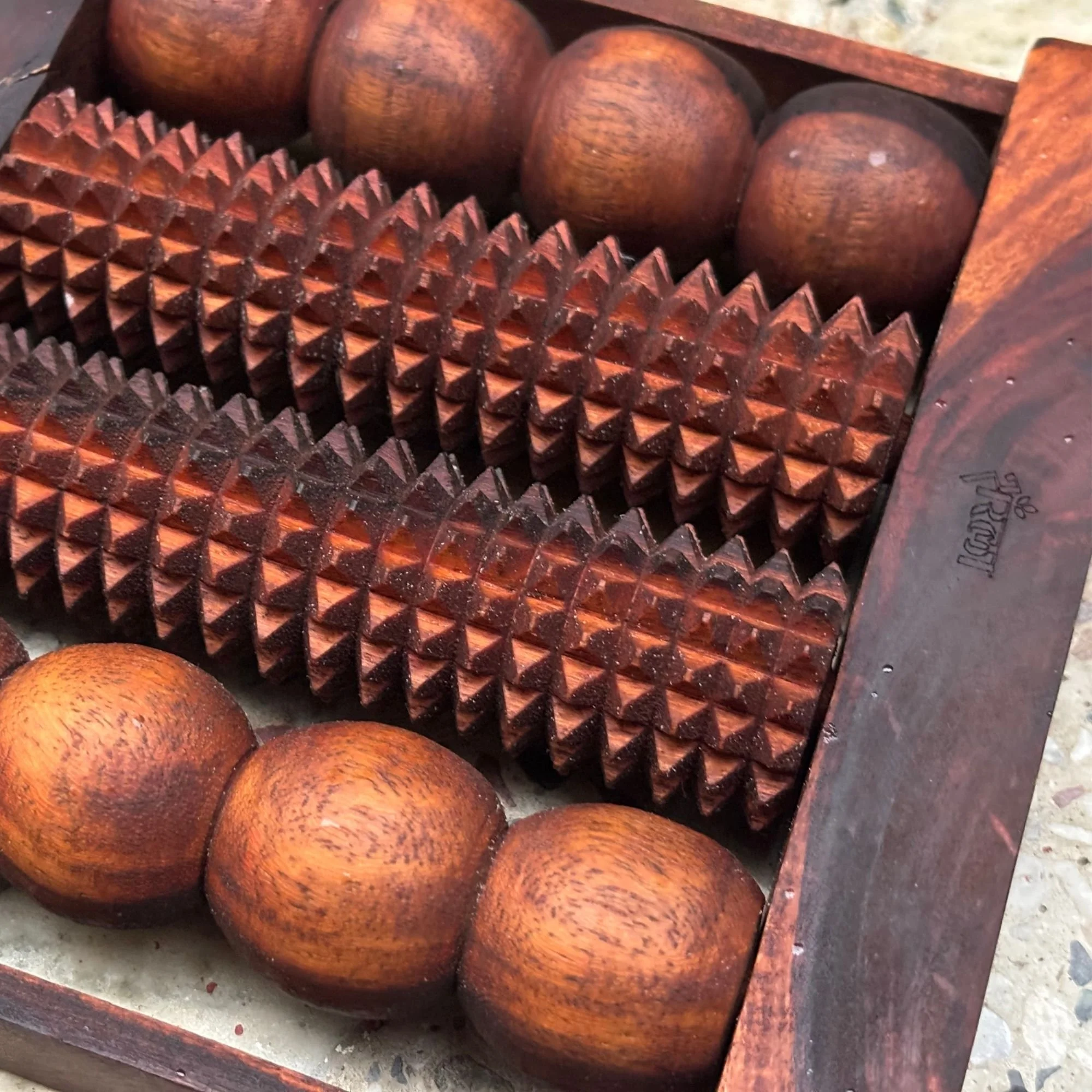 Wooden_foot_massager_closeup.jpg