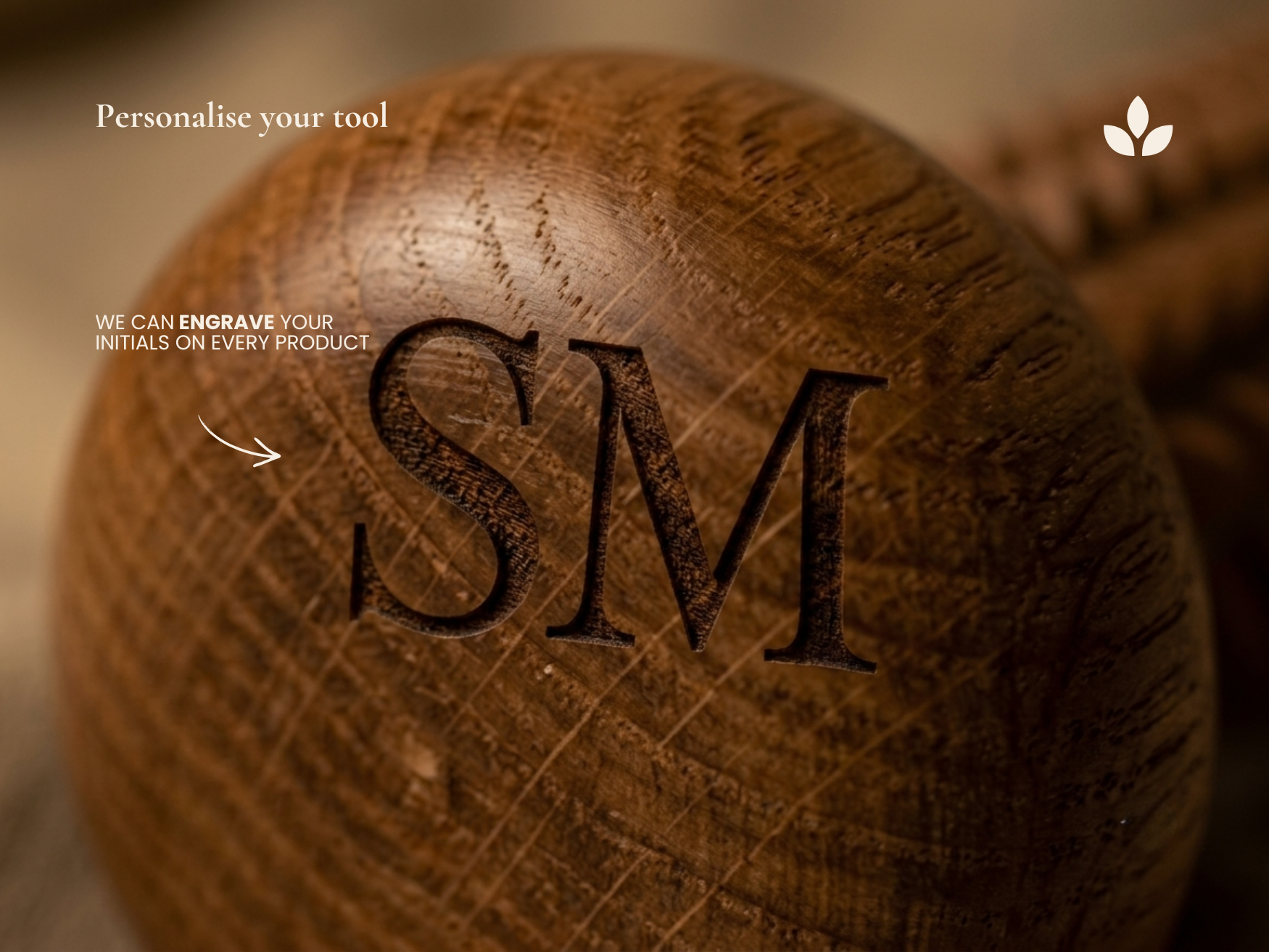 Close-up of personalised initials engraved on wooden recovery roller end cap