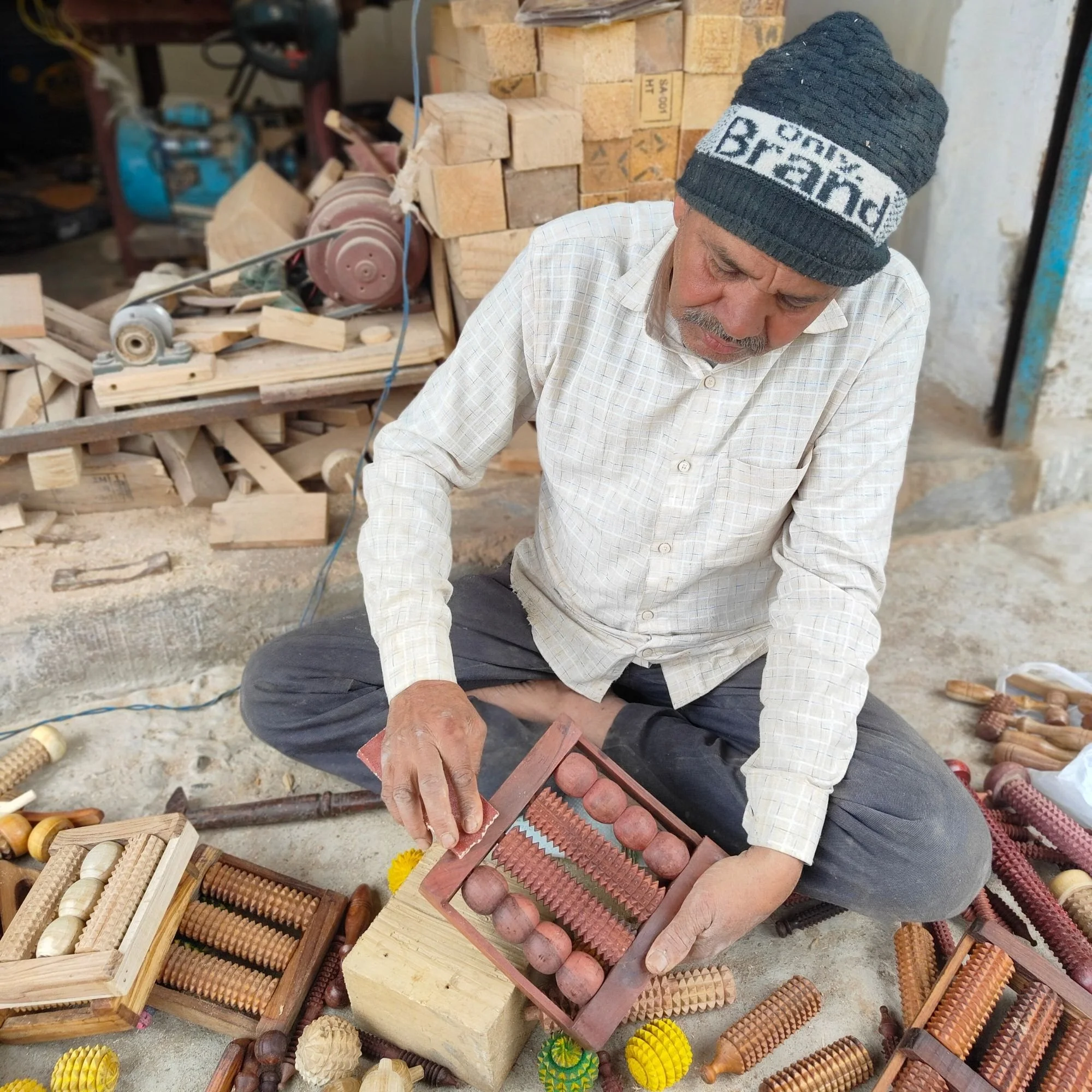 Wooden_foot_massager_artisan.jpg