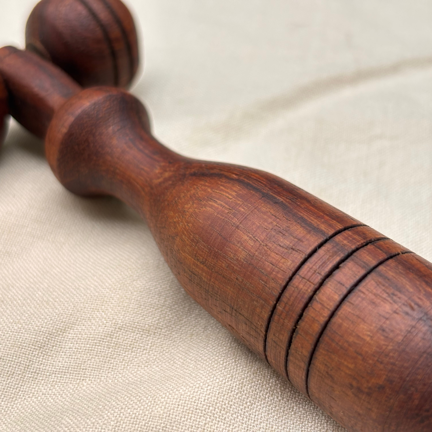 wooden-facial-massage-roller-handle-detail.png.png