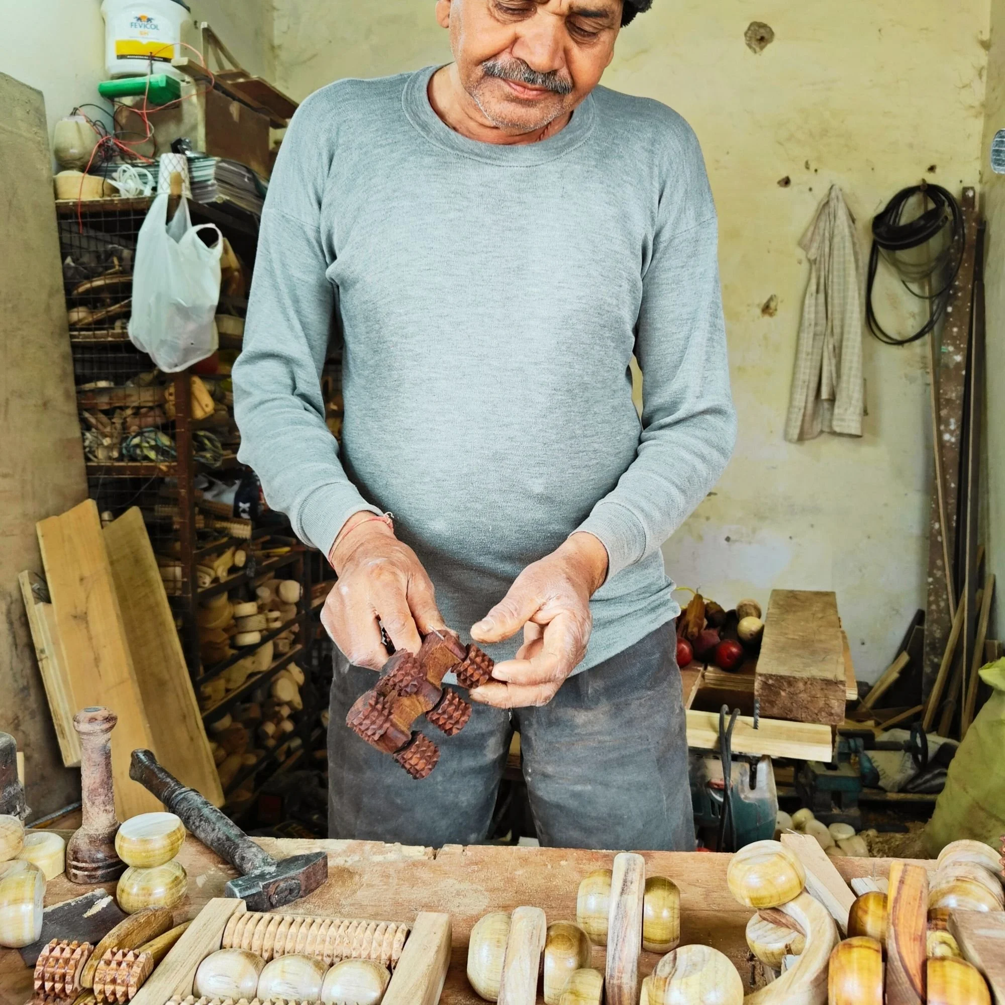 Handheld_wooden_body_massage_roller_artisan_workshop.jpg