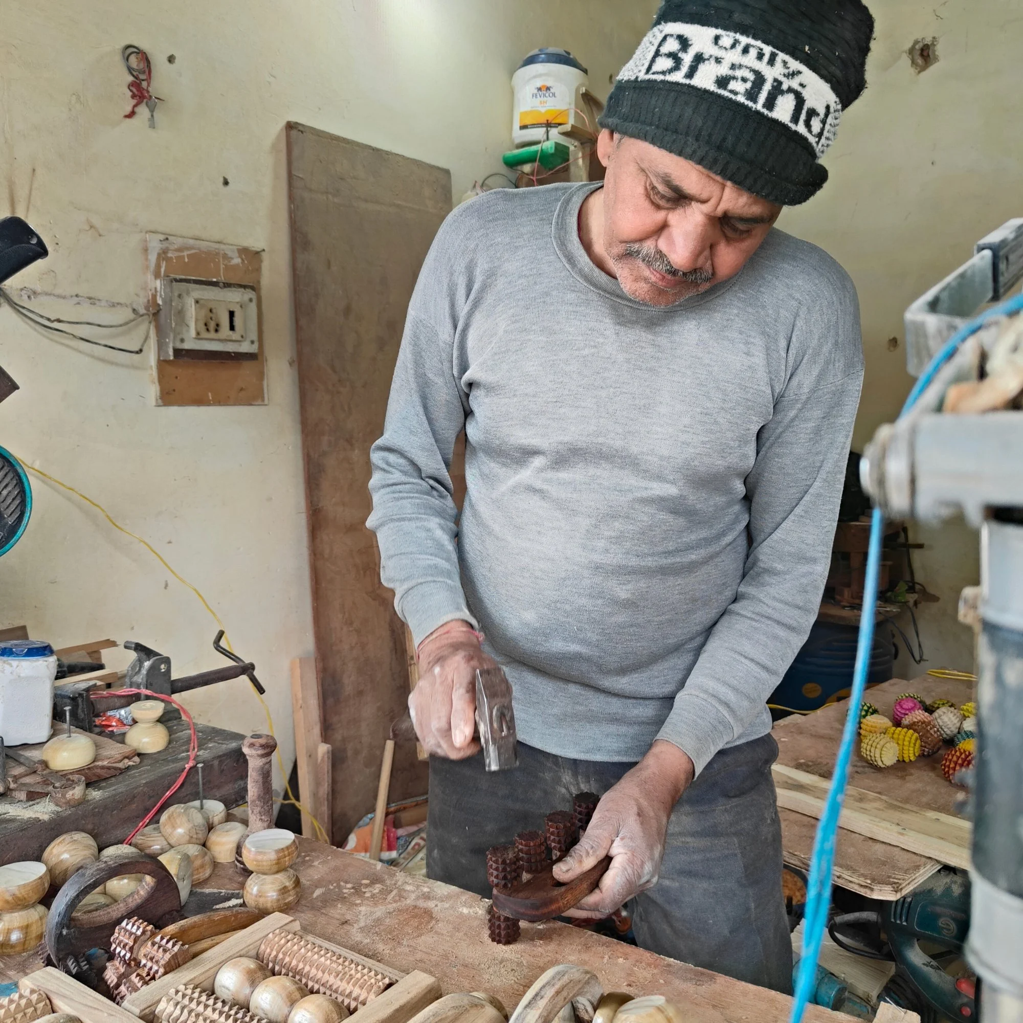 Handheld_wooden_deep_tissue_massager_artisan_workshop.jpg
