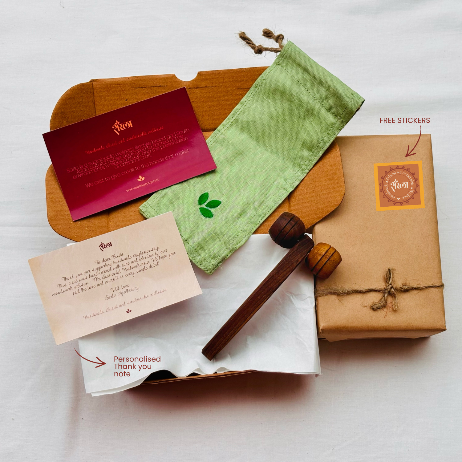 Wooden lymphatic face roller premium gift set with cotton pouch, recyclable box, thank-you note, wrapped gift and sticker.