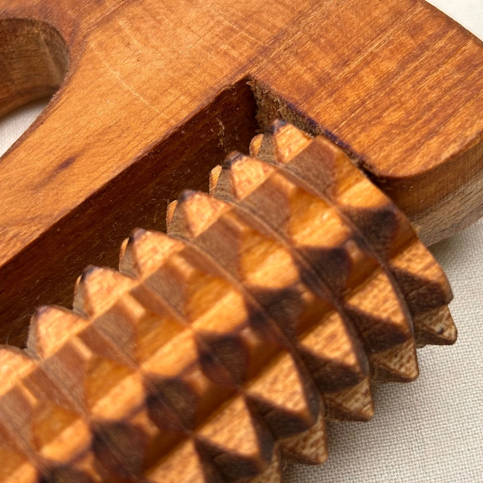 Wooden_cellulite_massage_tool_closeup.jpg