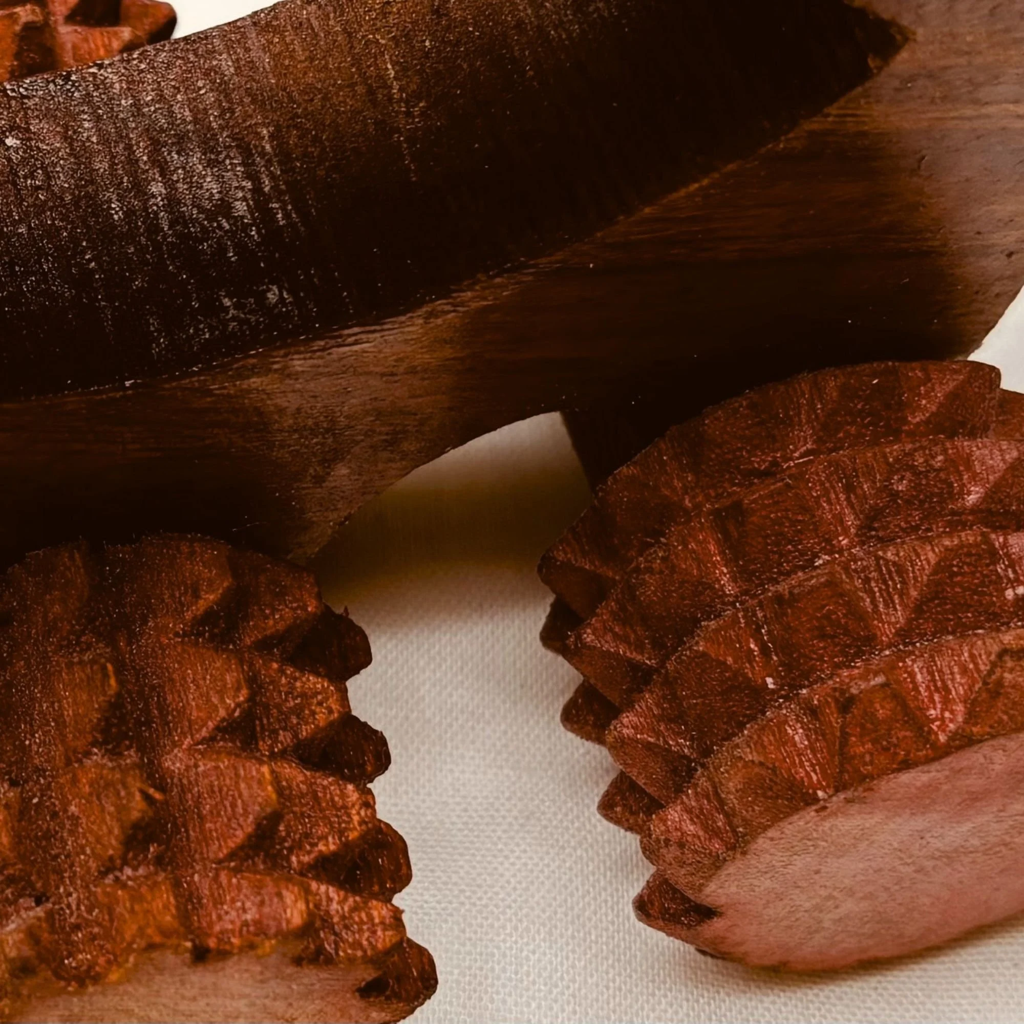 Handheld_wooden_body_massage_roller_closeup.jpg