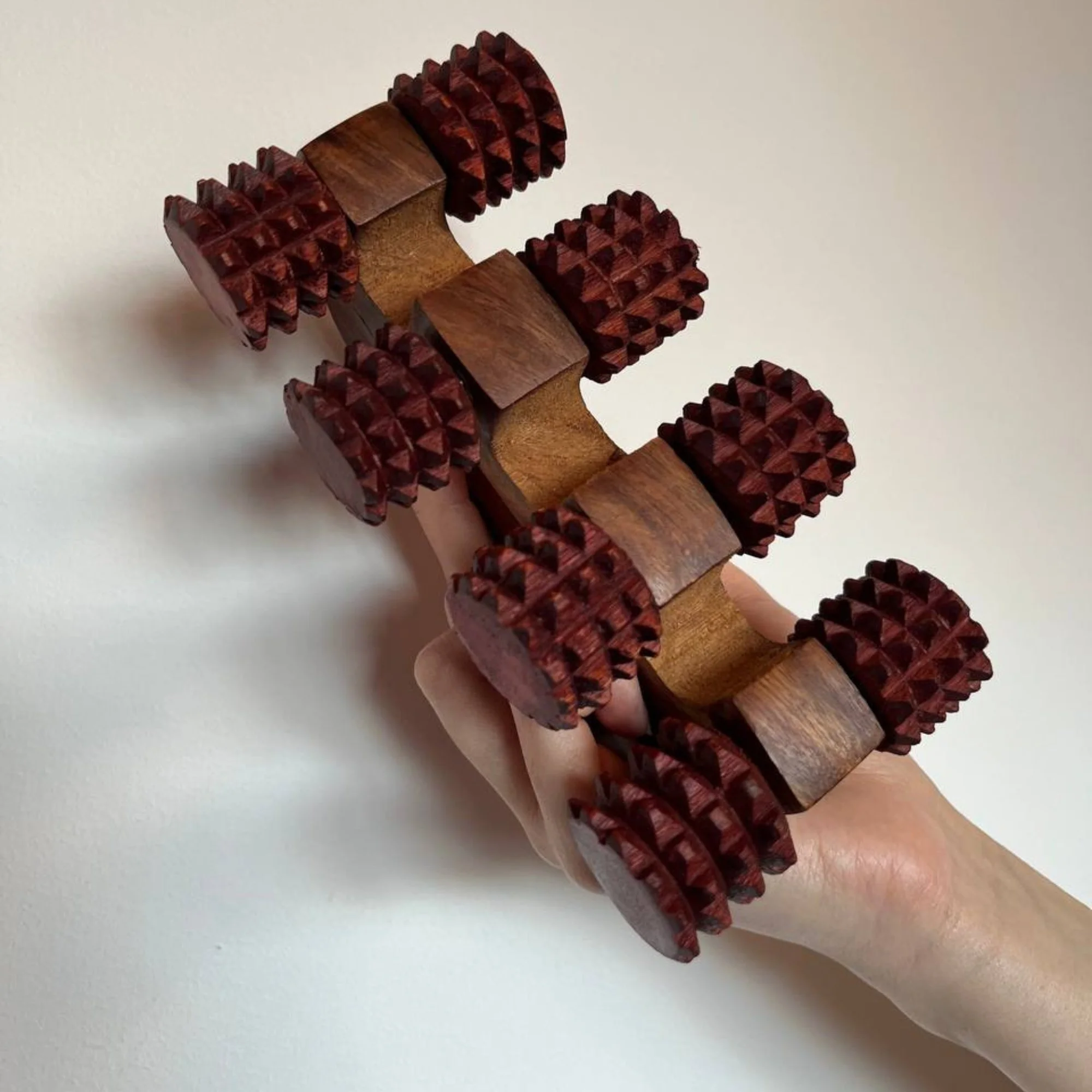 Handheld_wooden_deep_tissue_massager_hero.jpg