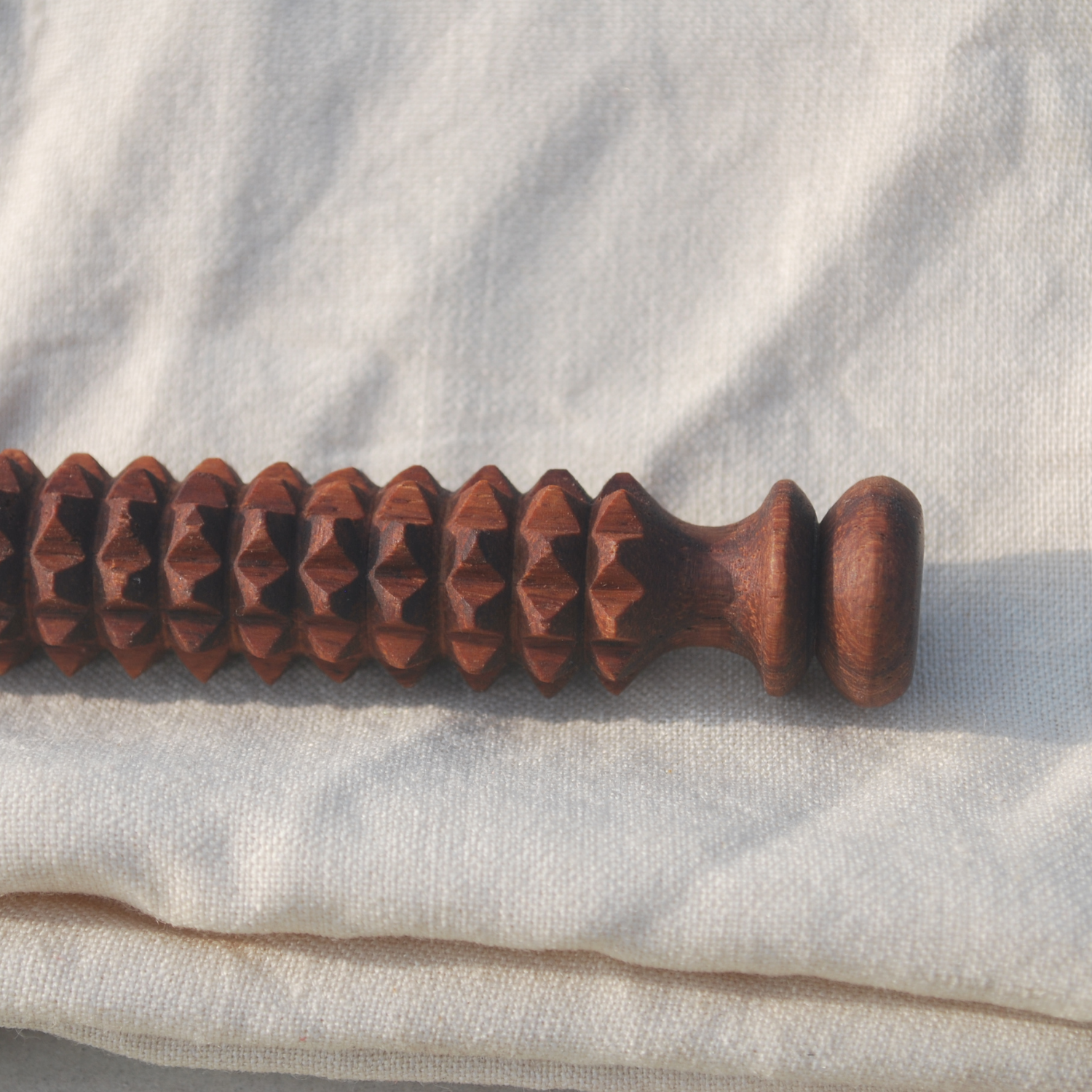 wooden-body-acupressure-massage-tool-back-closeup.png.png