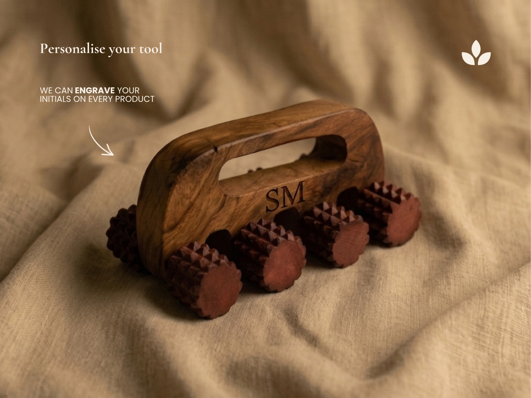 Personalised handheld wooden deep tissue massager with engraved initials on handle