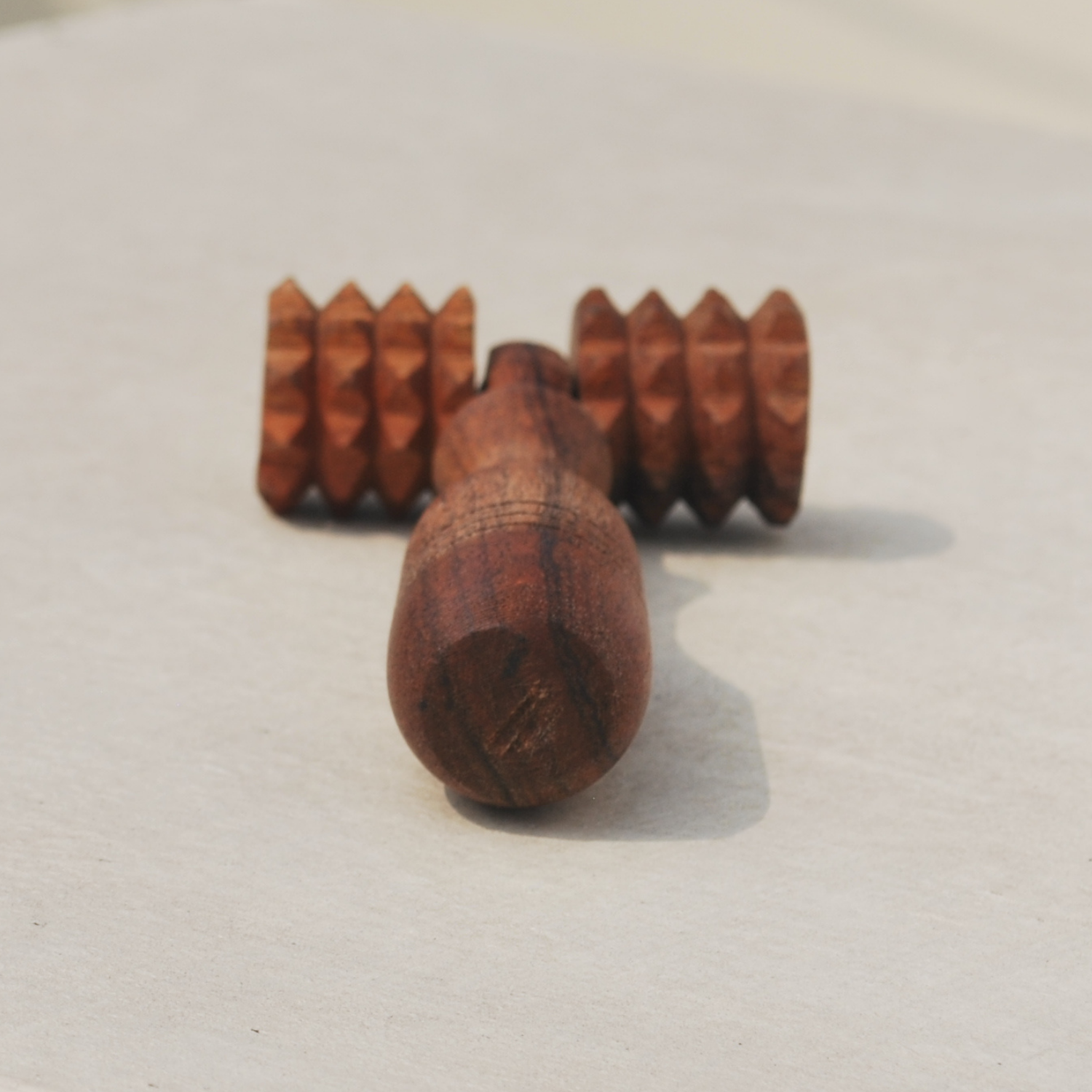 wooden-deep-tissue-massage-roller-back-closeup.png.png