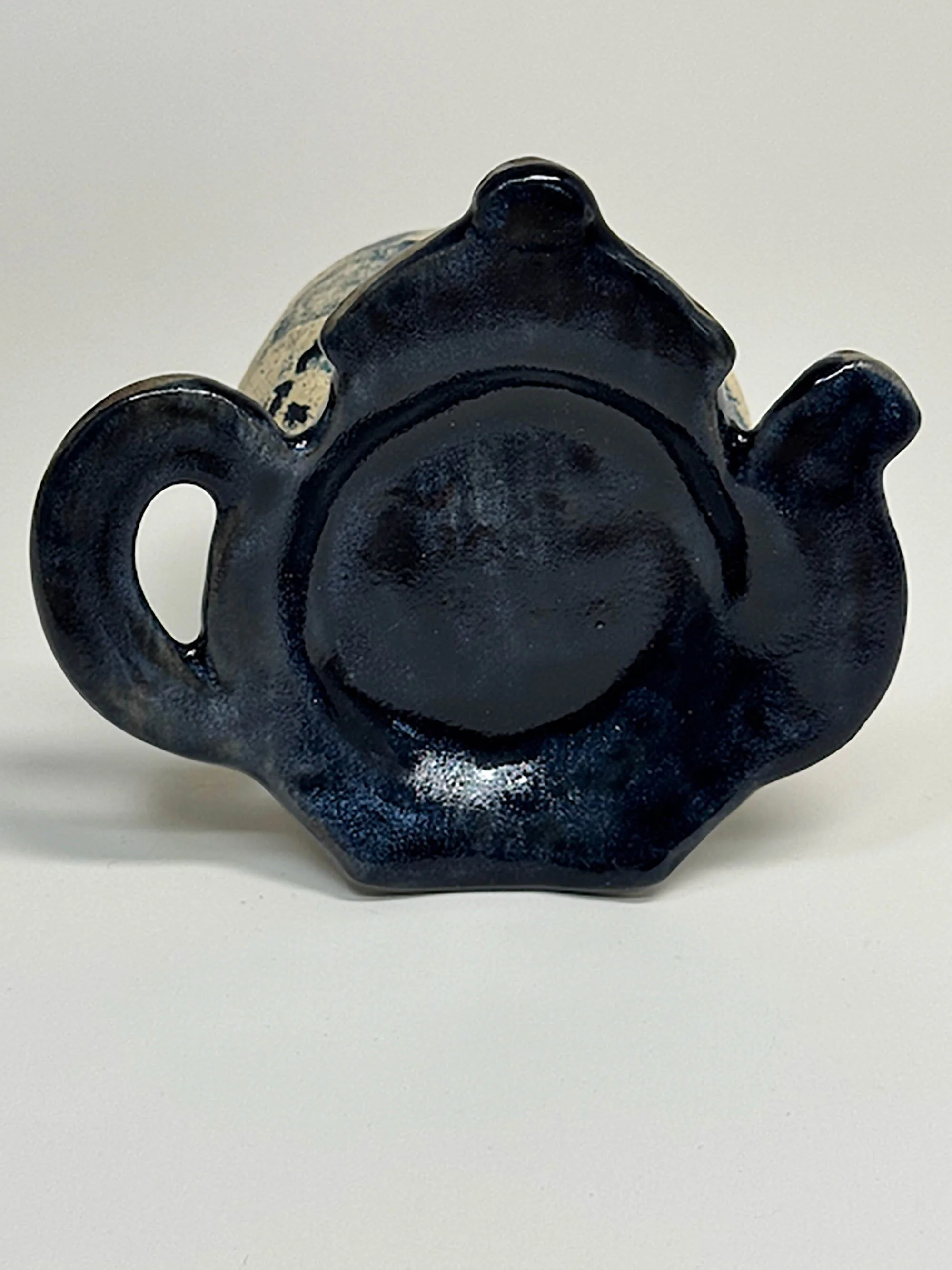 Teapot tea bag and spoon rest