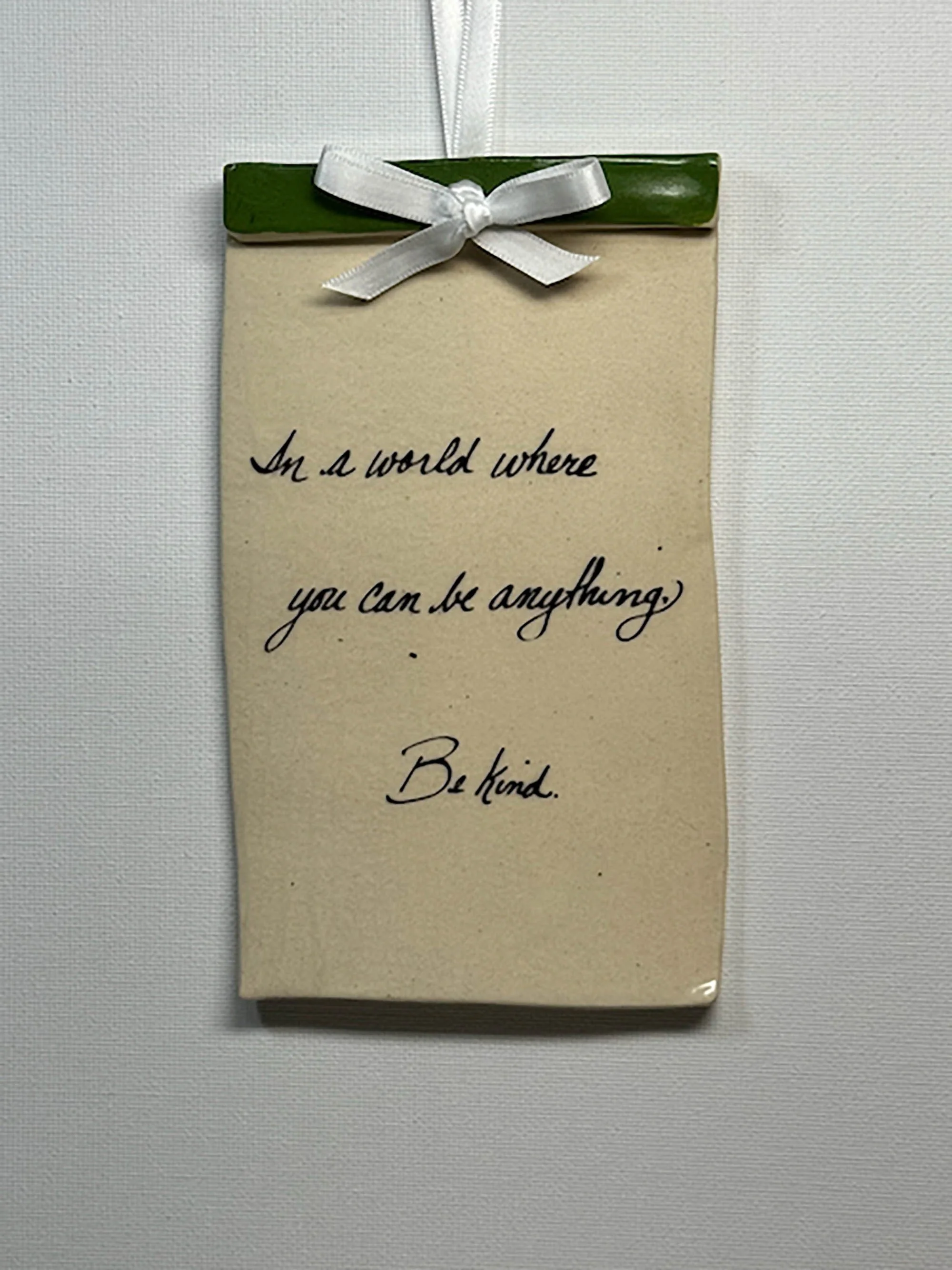 "In a world where you can be anything, be kind."
