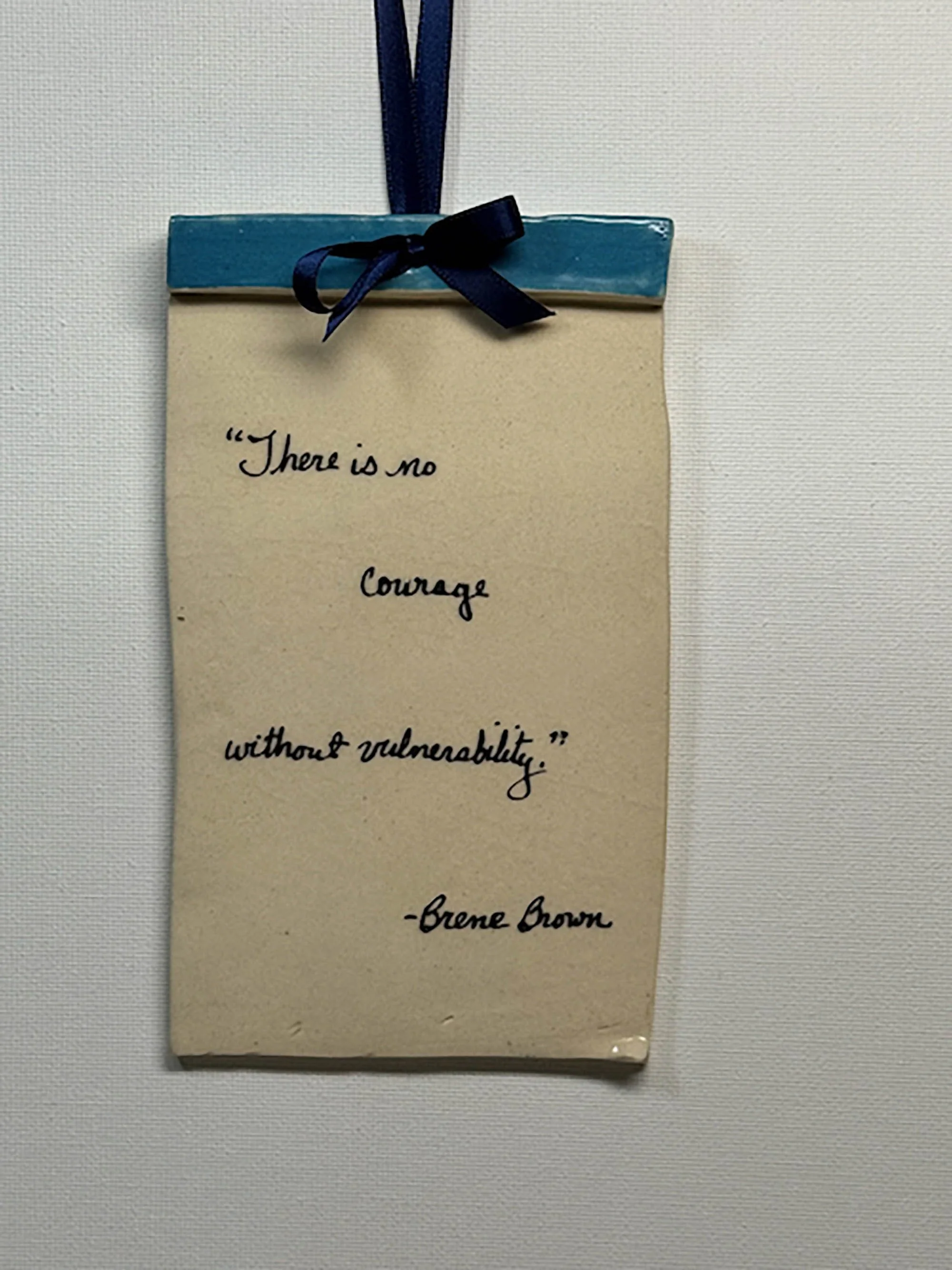 "There is no courage without vulnerability." (blue)