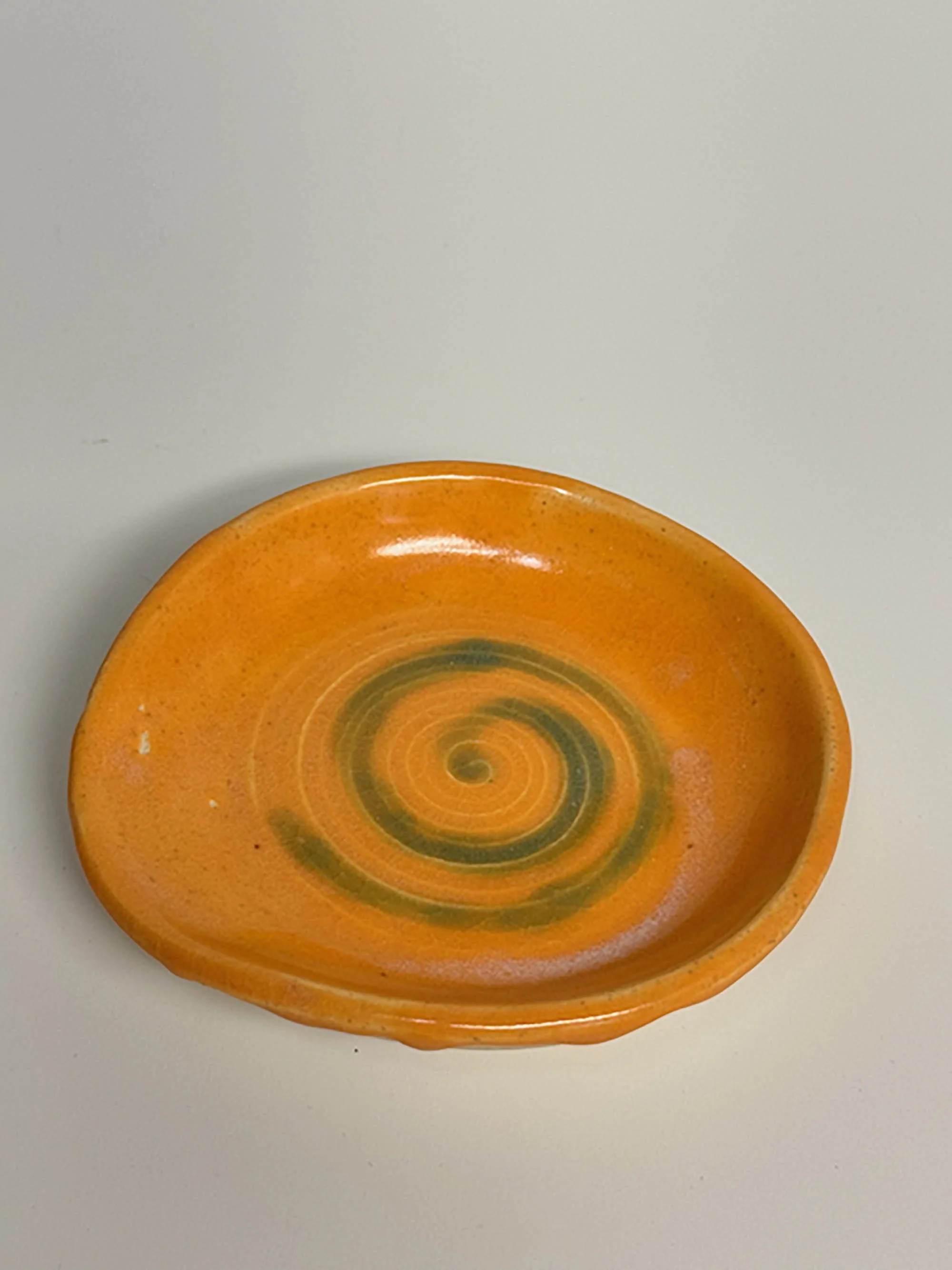 Cooking spoon rest - orange  w/ green swirl