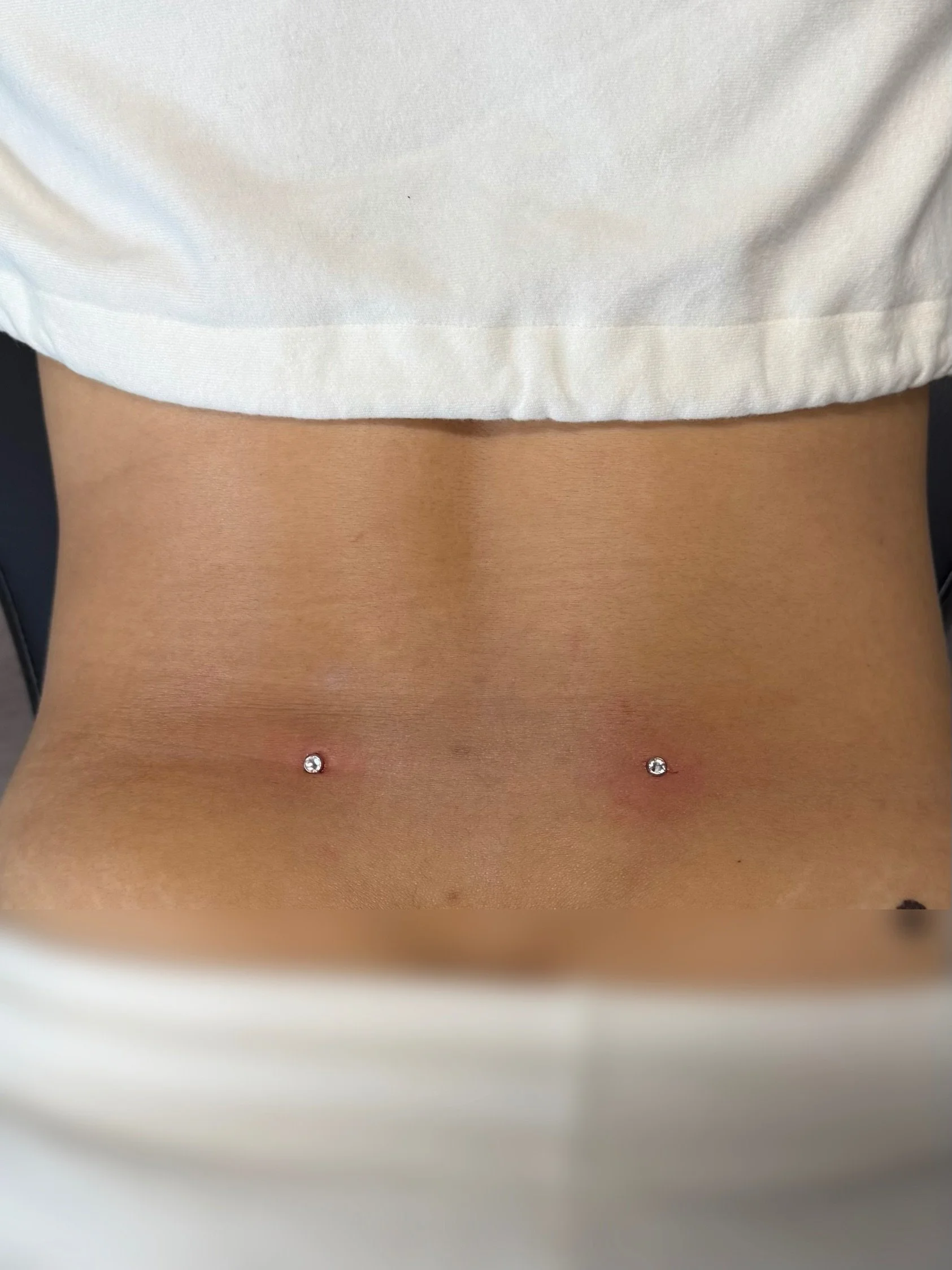 Iggy-Luppino-back-dermal-piercing-sink-or-swim-niagara-falls-ny.jpg