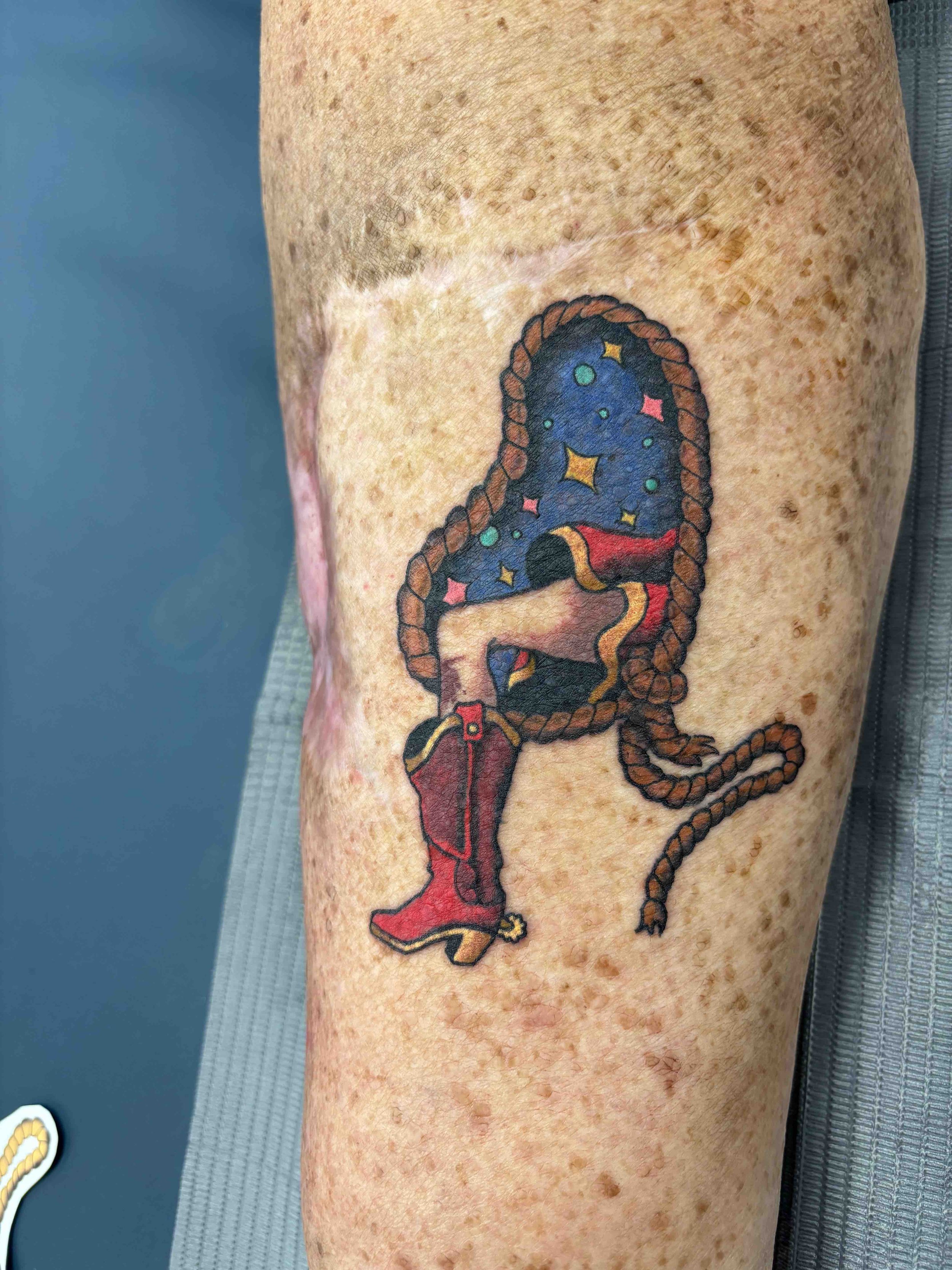 American Tradtional Cowgirl boot and portal tattoo in color on the inside of a calf by AK Zaionz at Sink or Swim in  Niagara Falls NY