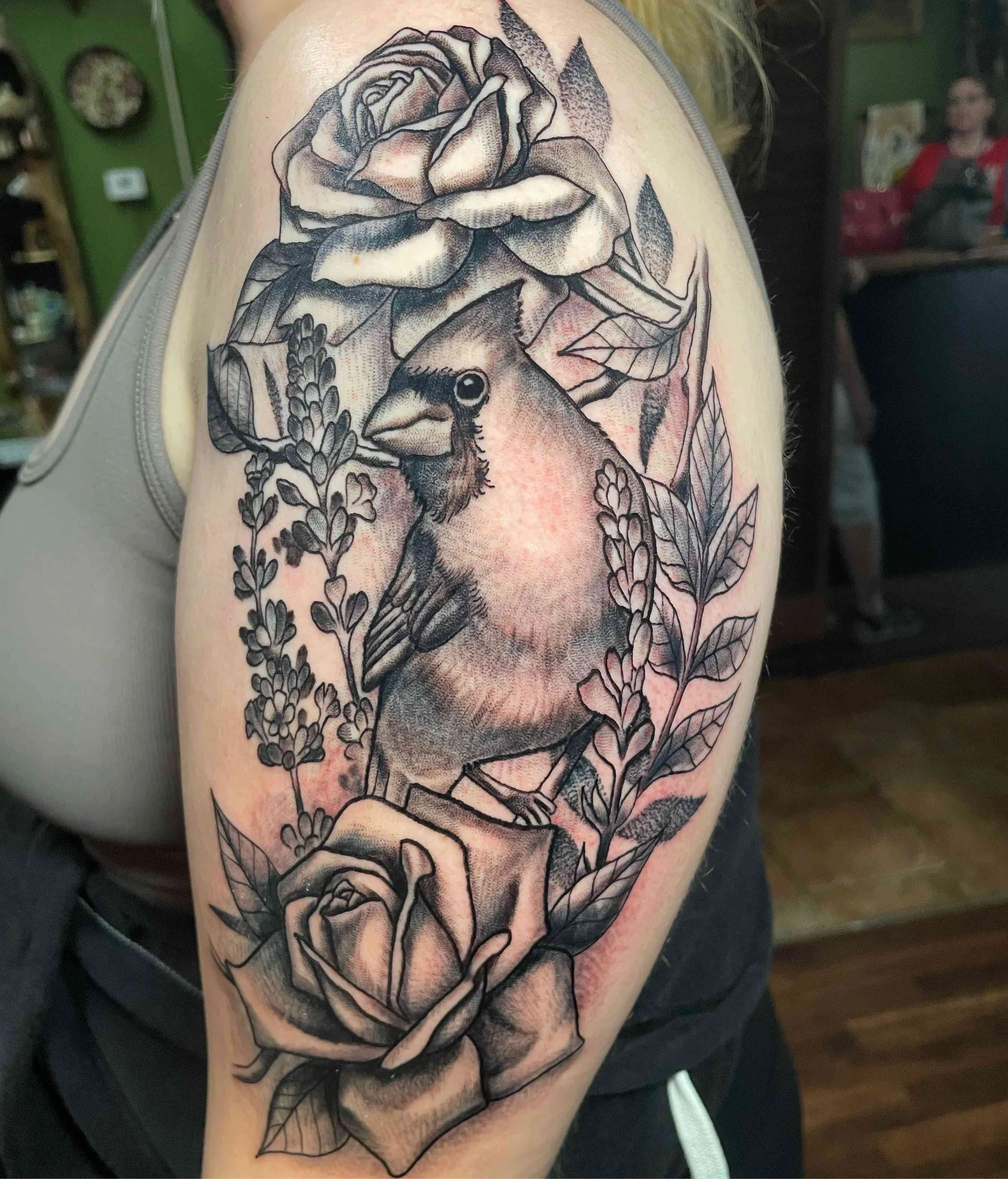 Black and grey illustrative floral bird tattoo, portfolio work by Emily Quartley at Sink or Swim Tattoo and Piercing in Niagara Falls, NY