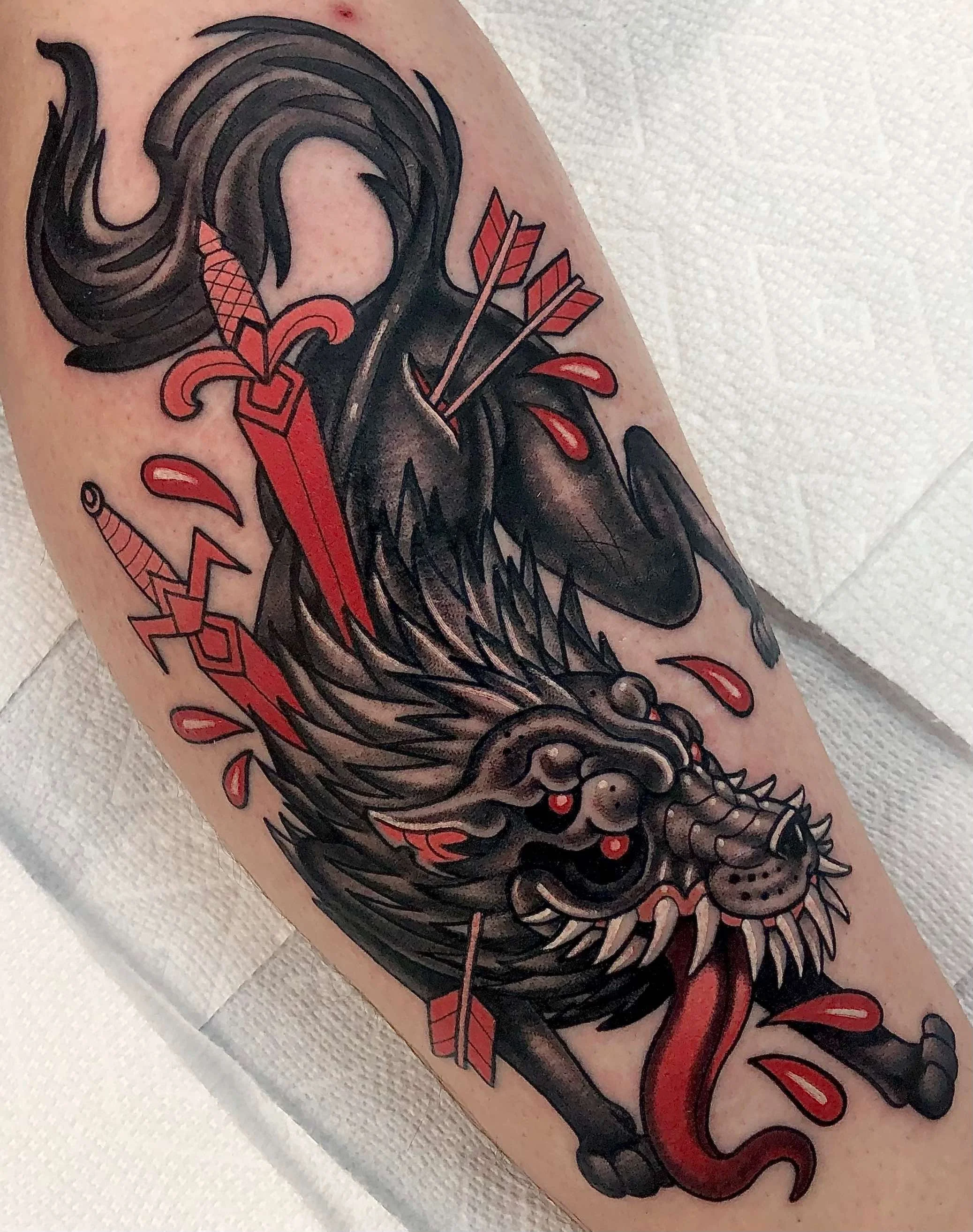 neo traditional wolf with sword and arrows, portfolio work by Keith Kuzara at Sink or Swim Tattoo and Piercing in Niagara Falls NY