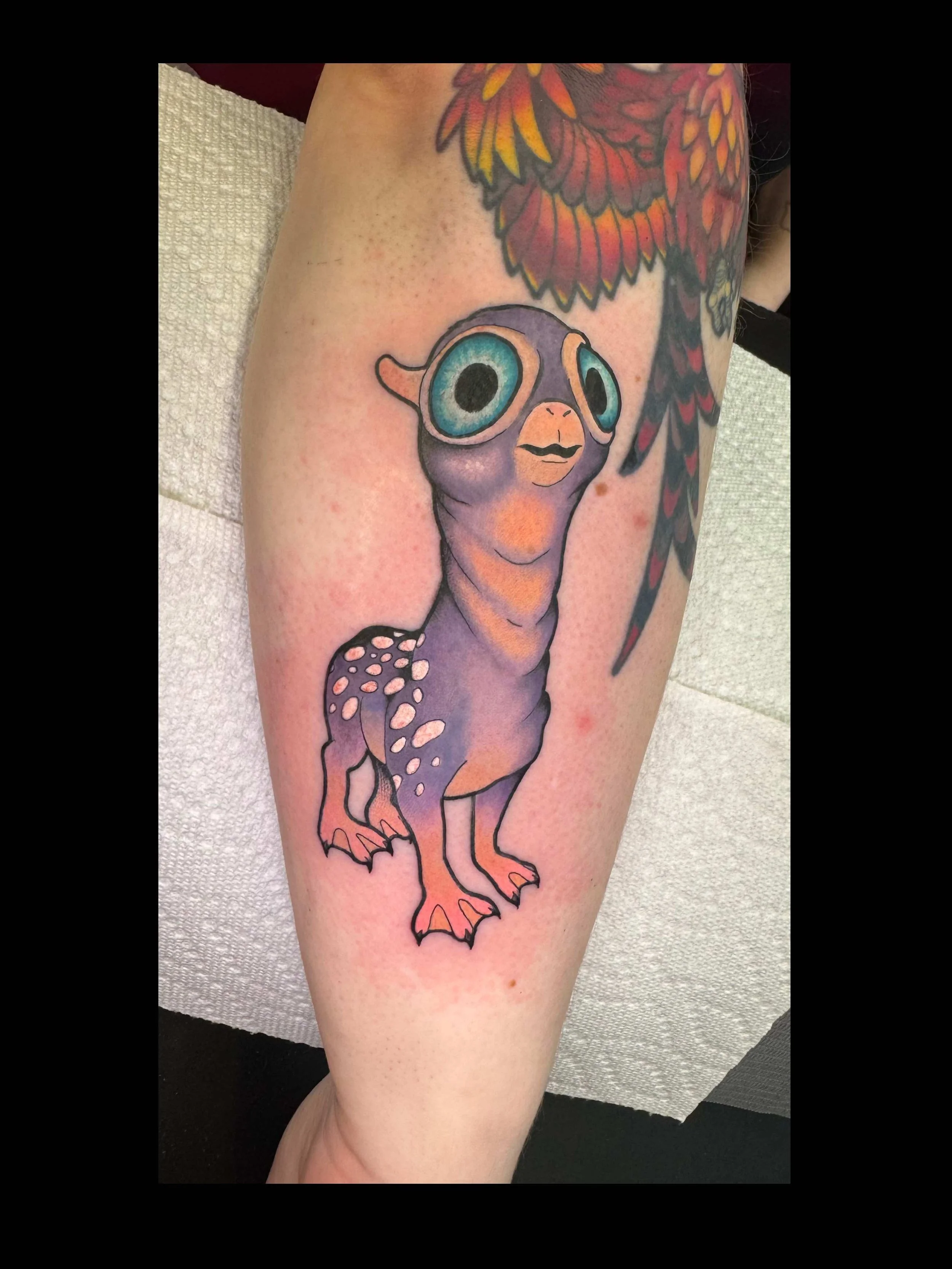 Neo traditional harry potter mooncalf creature tattoo in color portfolio work by Shannon Kuzara at Sink or Swim Tattoo and Piercing in Niagara Falls NY