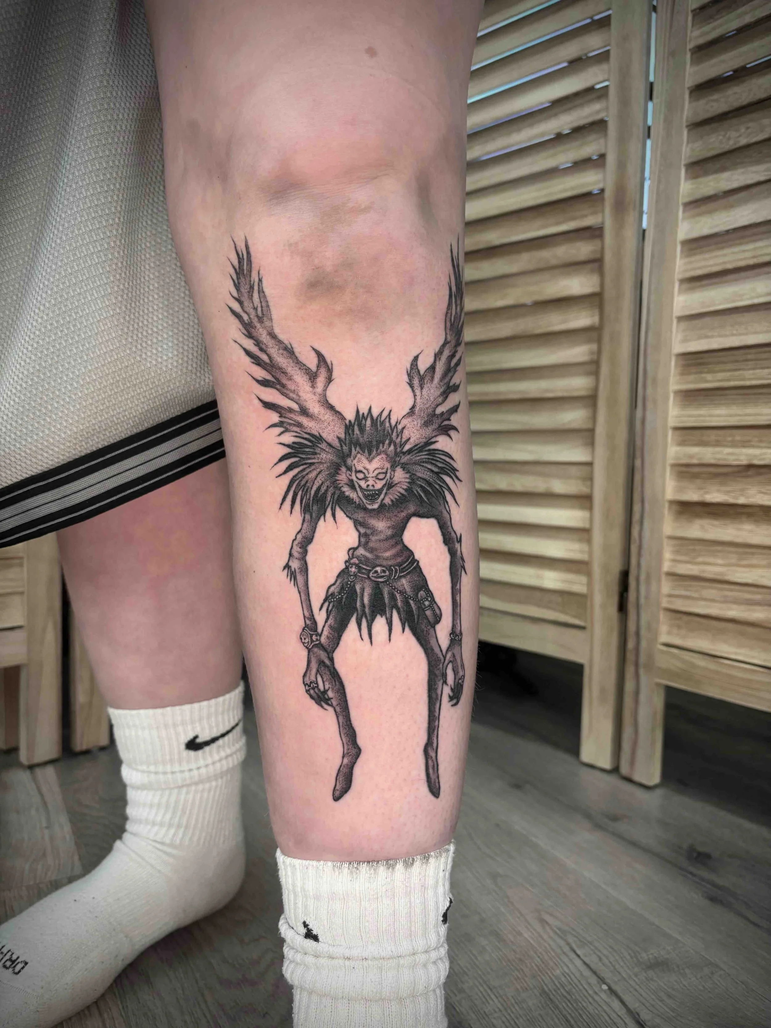 Rick from death note, black and grey tattoo on shun , portfolio work by Brooke Canzoneri at sink or swim tattoo and piercing in Niagara Falls, ny