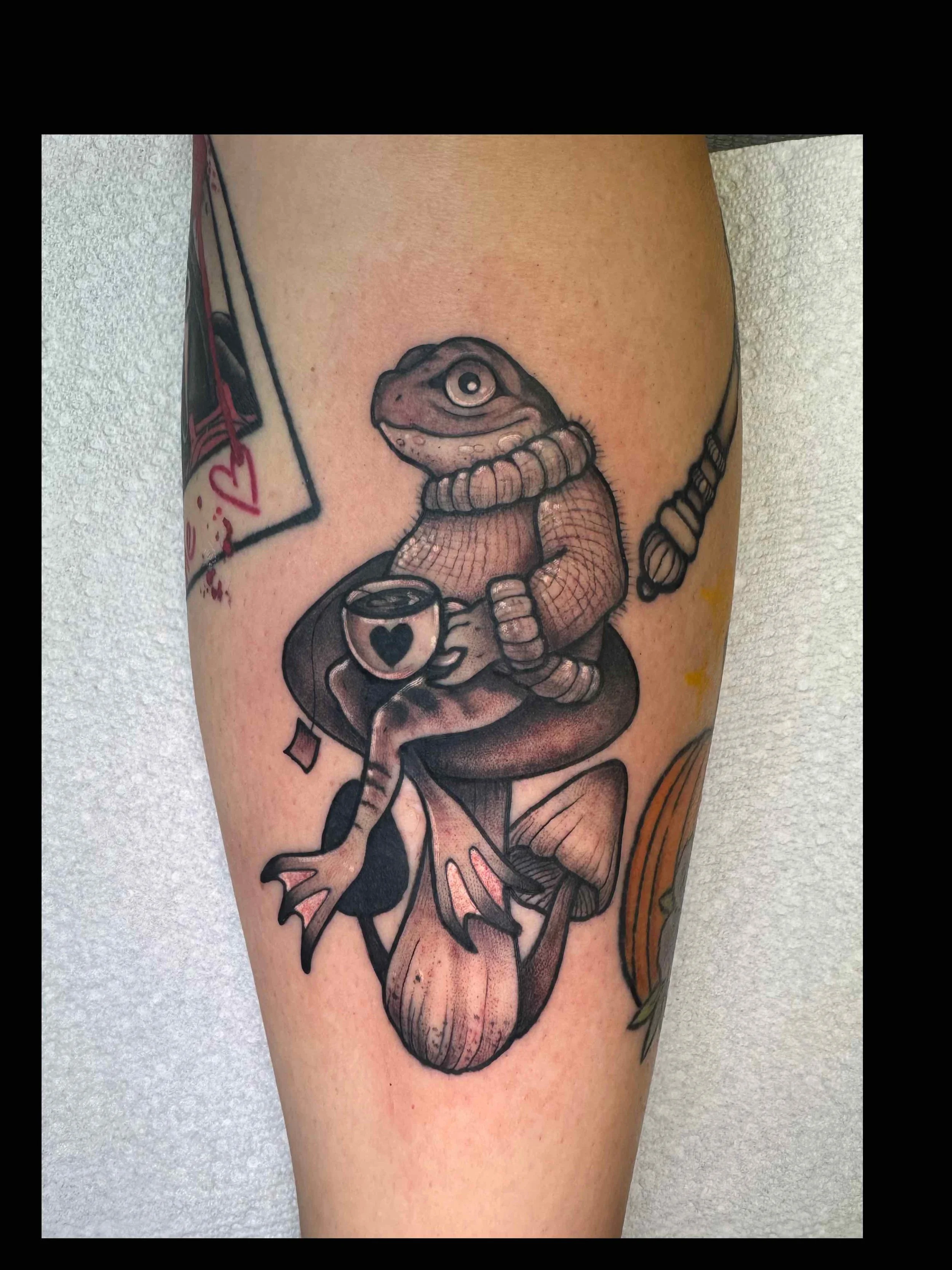 shannon-kuzara-frog-mushroom-tea-tattoo-sink-or-swim-niagara-falls-ny.jpg