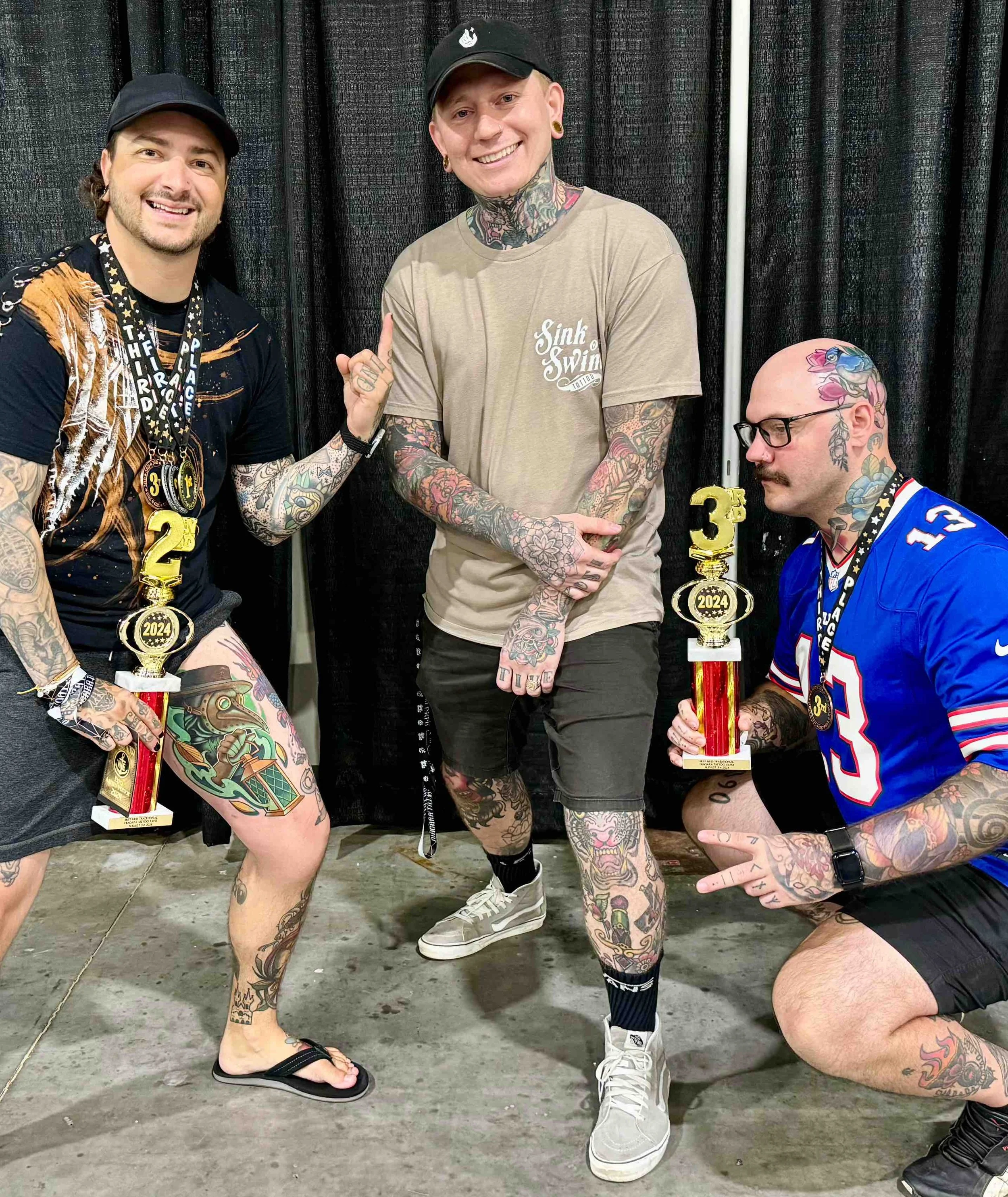 Keith with Iggy Luppino and holding multiple awards from the niagara tattoo convention
